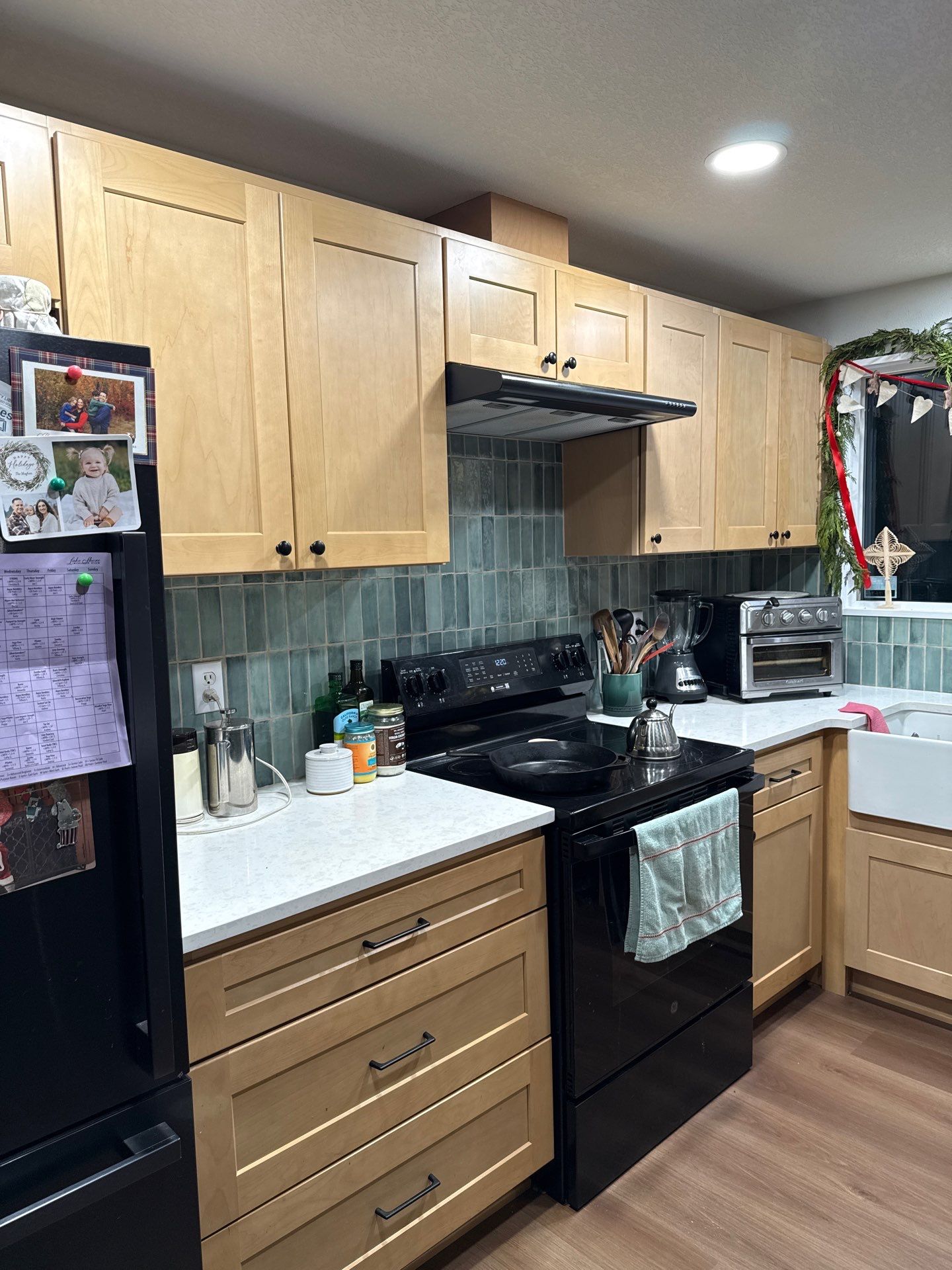 Vancouver Kitchen Renovation Featuring Tile Backsplash and Farmhouse Sink by American Made Construction 