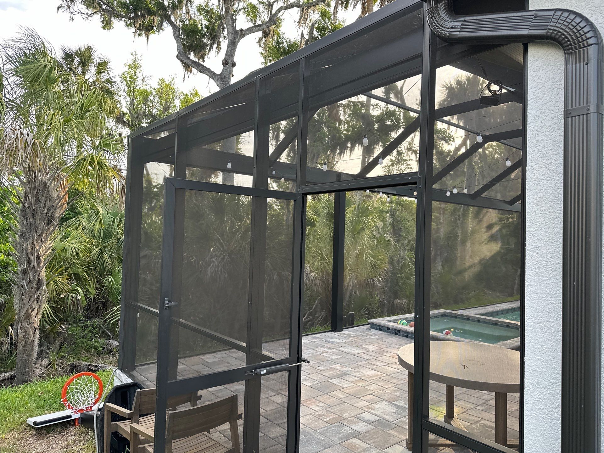 Screen Enclosure & Paver Pool Deck Cleaning in Trevesta Community, Palmetto, FL | Sunshine AquaWash by Sunshine AquaWash