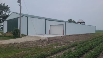 Reskin pole barn and add lean-to by Dagny Builders