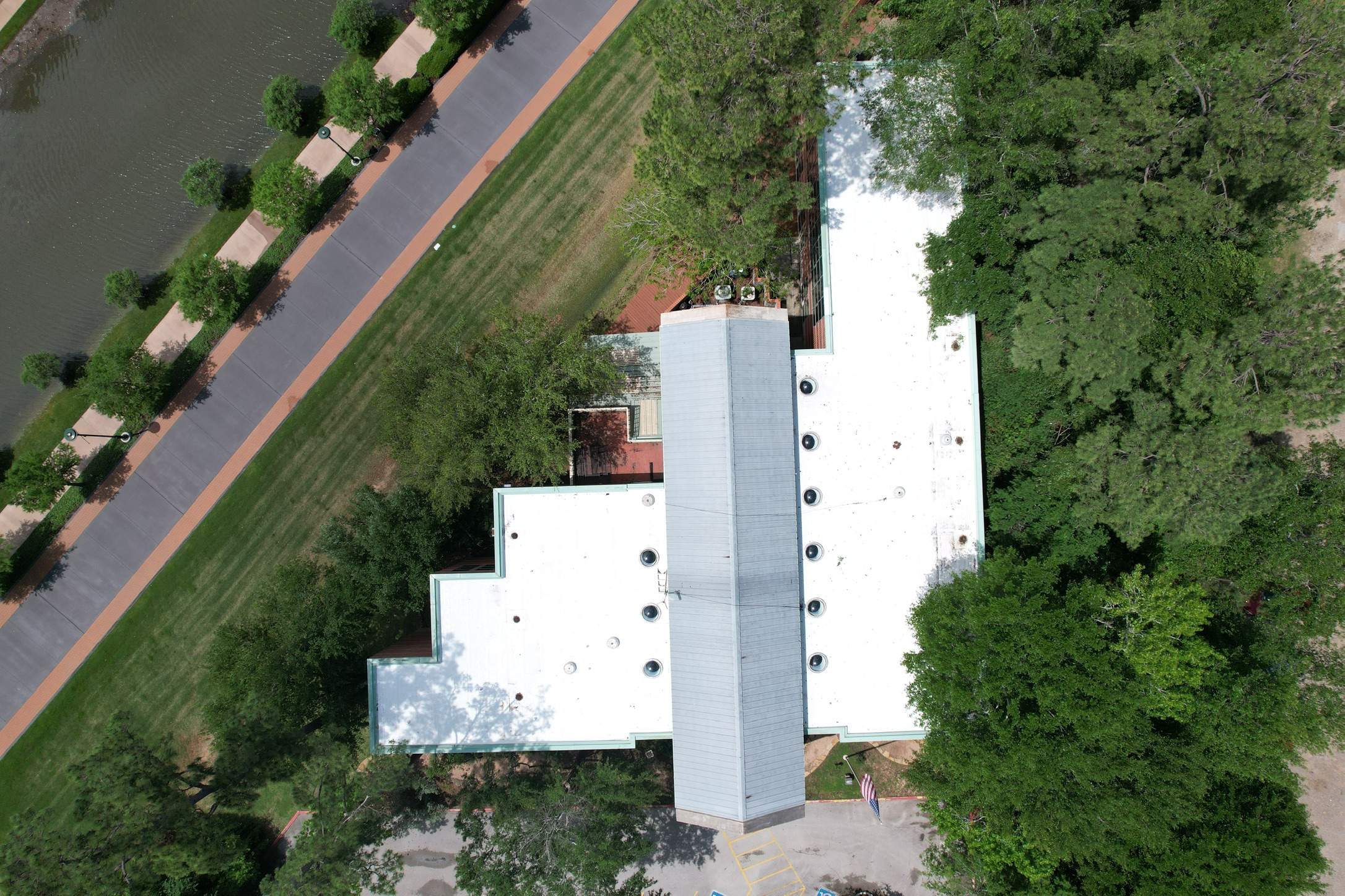 Commercial Roofing Restoration using GAF Unisil Silicone by STX Roofing