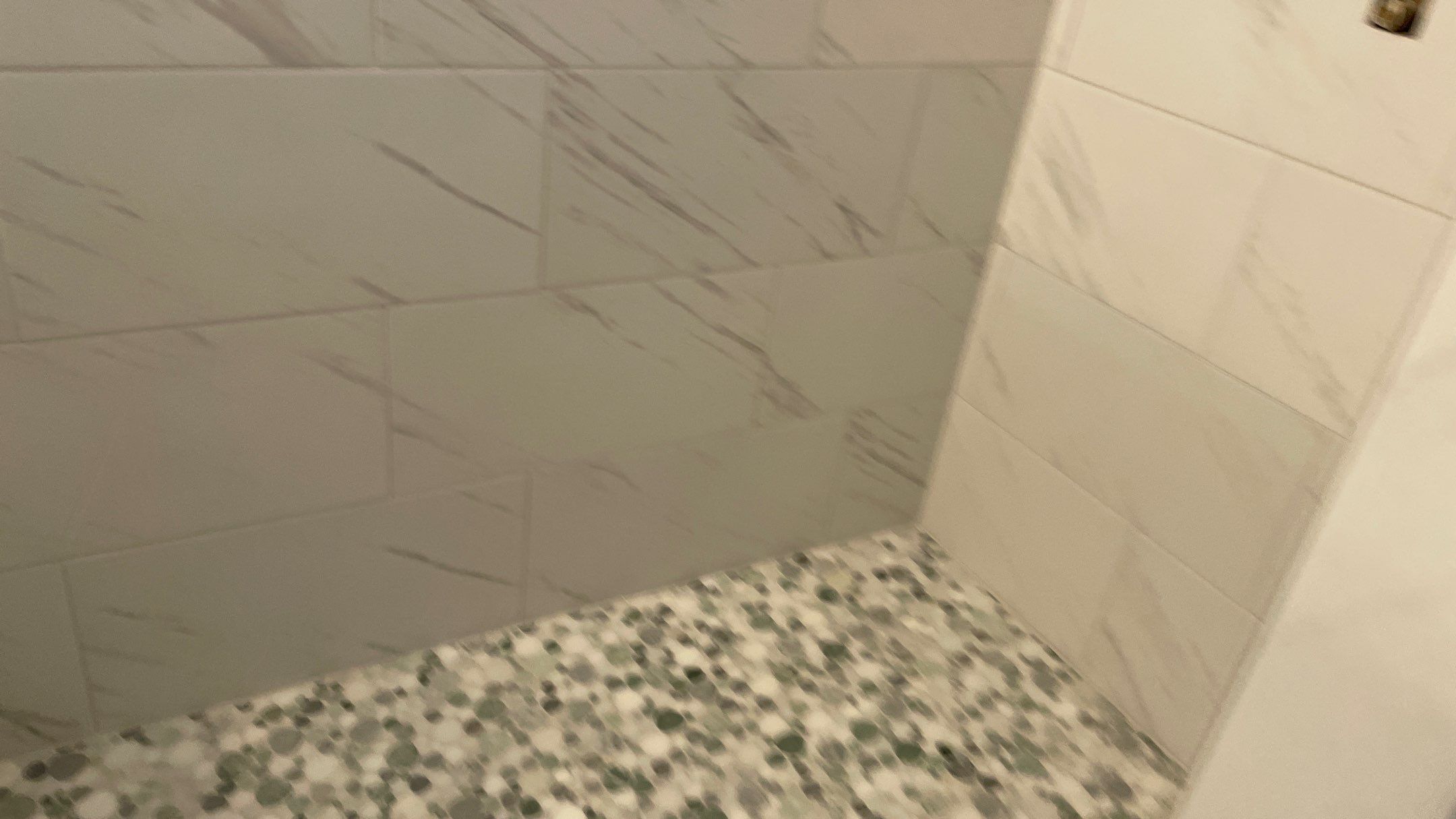 Bright Bathroom Remodel with Wall Removal, Stand Alone Tub and New Vanity by Footprints Floors of Coastal Carolina