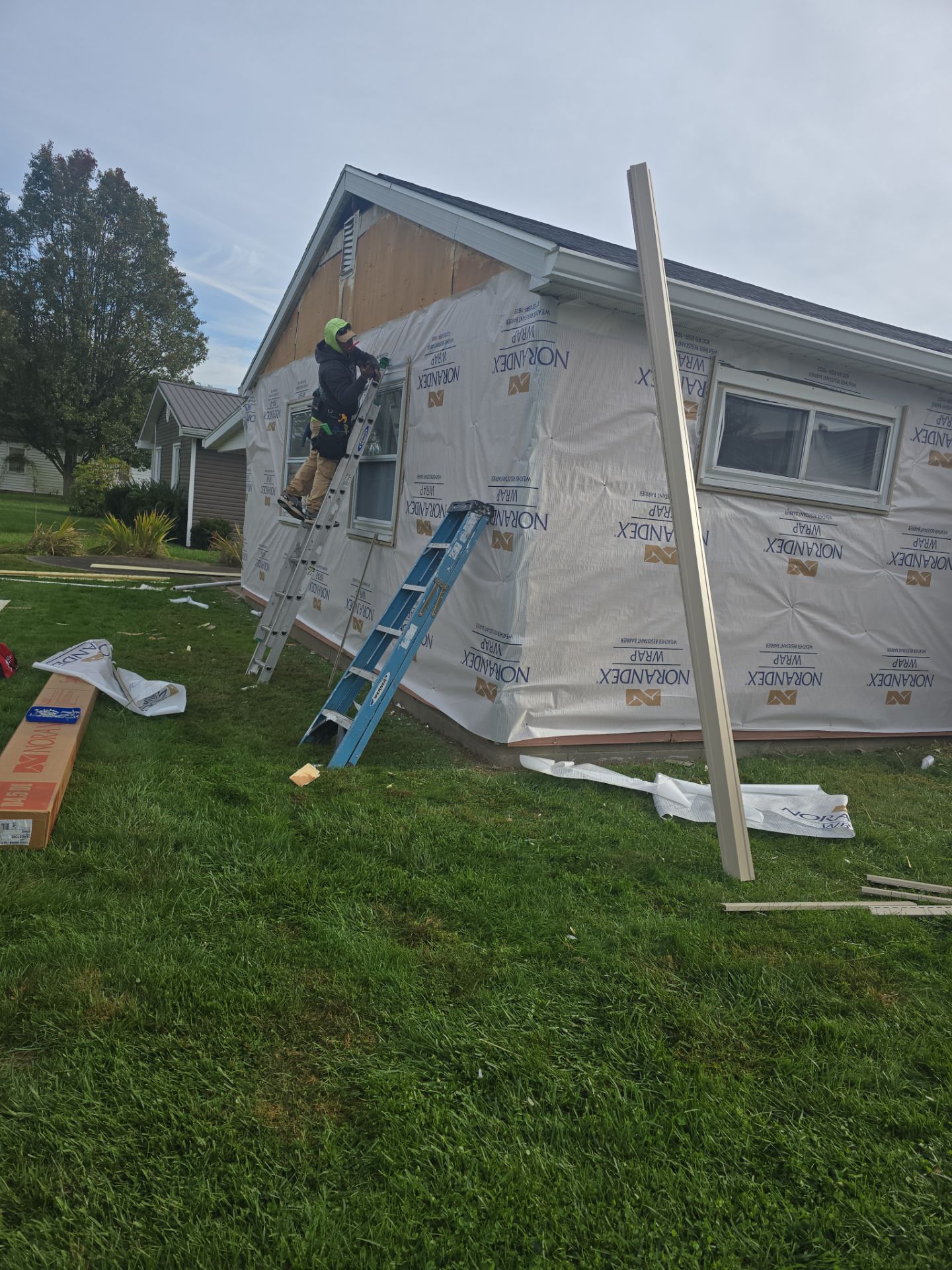 Siding Installation using Vinyl Siding by Rainstoppers Roofing