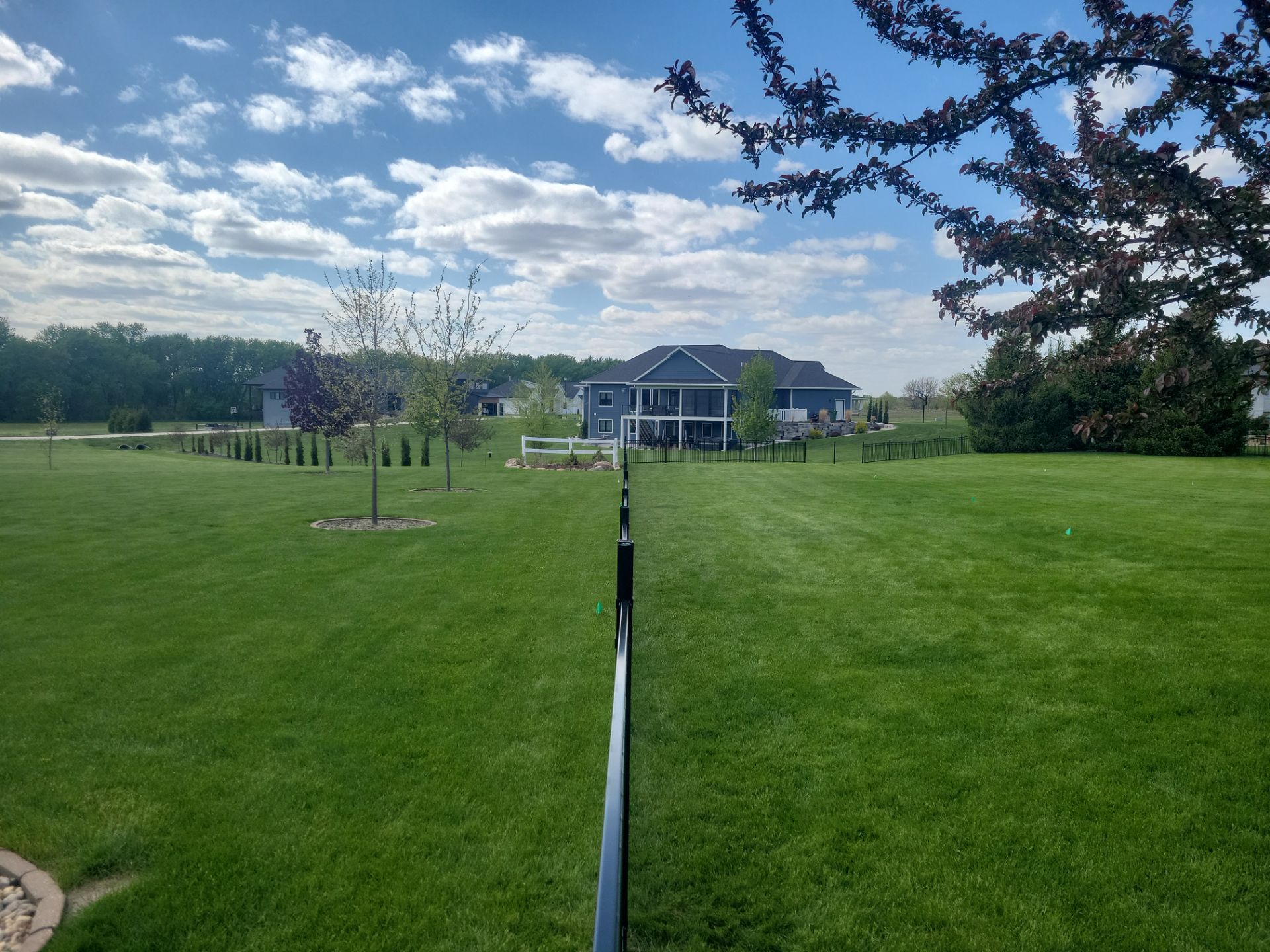 Black Ornamental Metal Picket Fence Installation in Waterloo by Perfect Picket Fence and Stain