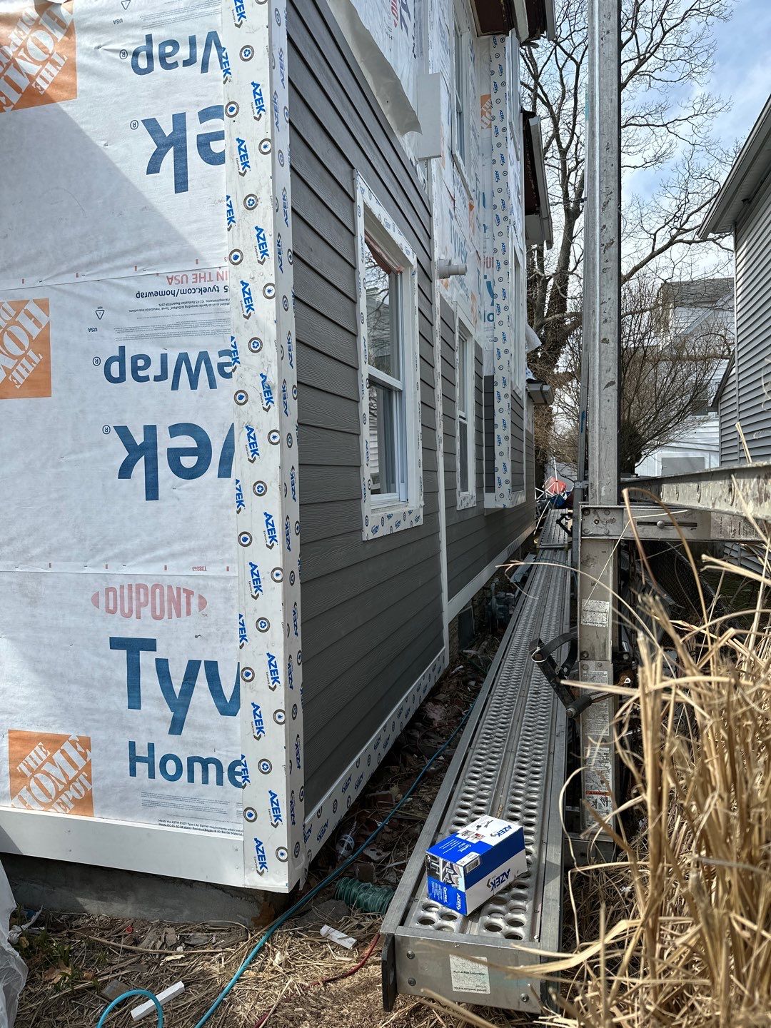 Siding Installation using Hardie Plank Aged Pewter by A Plus Exterior