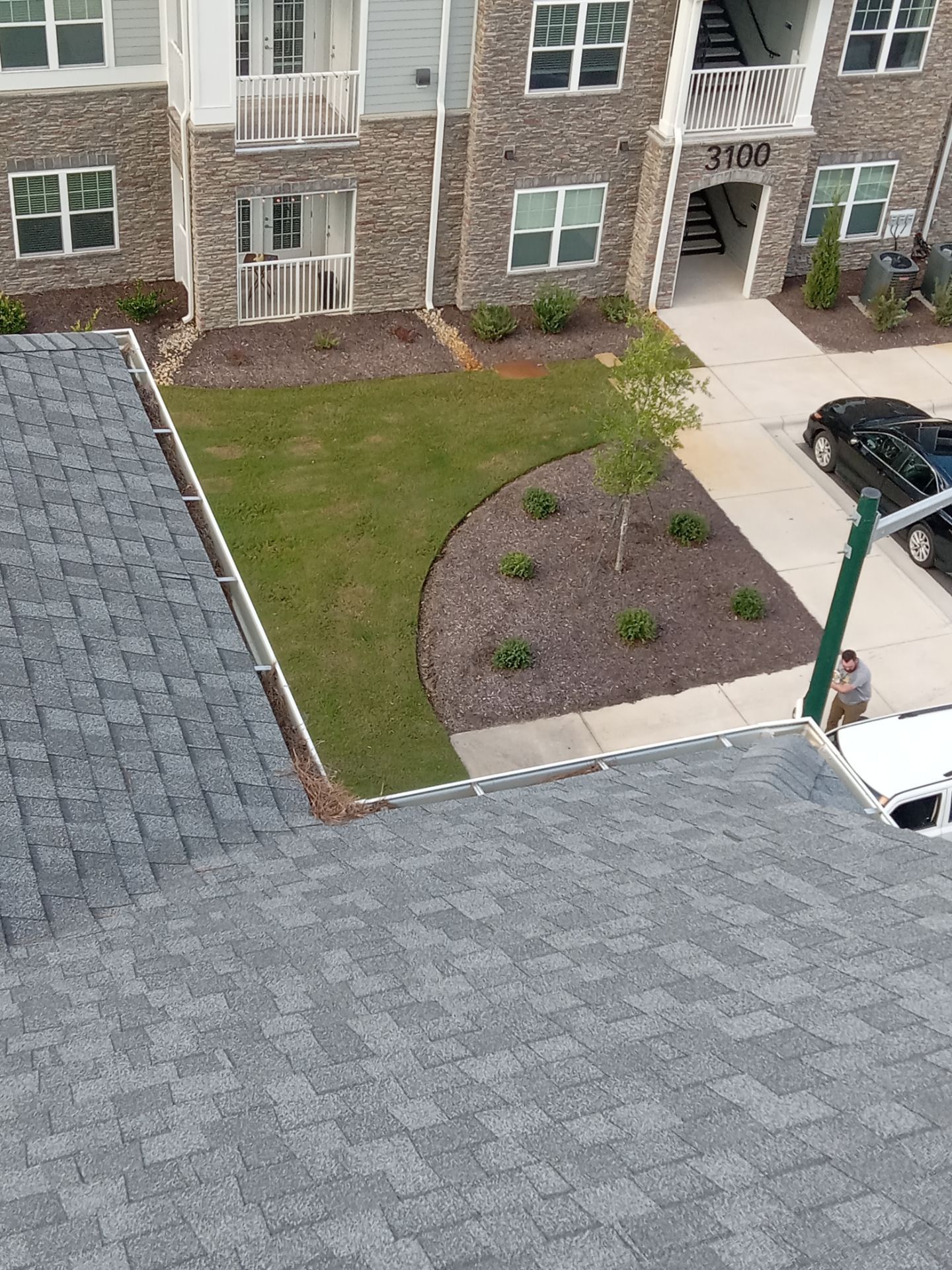 Commercial gutter cleaning New Bern & Havelock, NC before photo with filled gutters