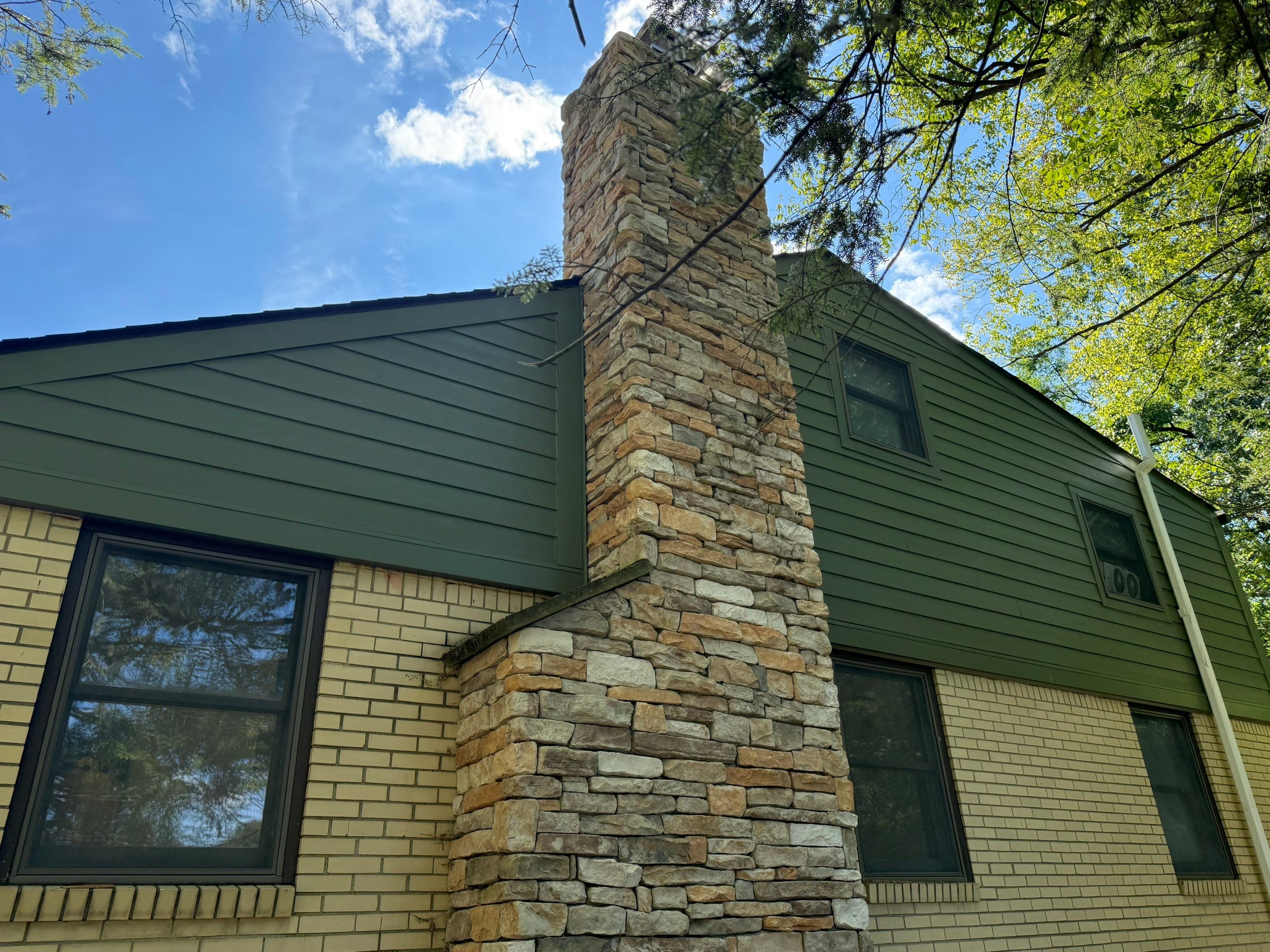 Hardie siding  by Cousins Roofing Siding & Decks