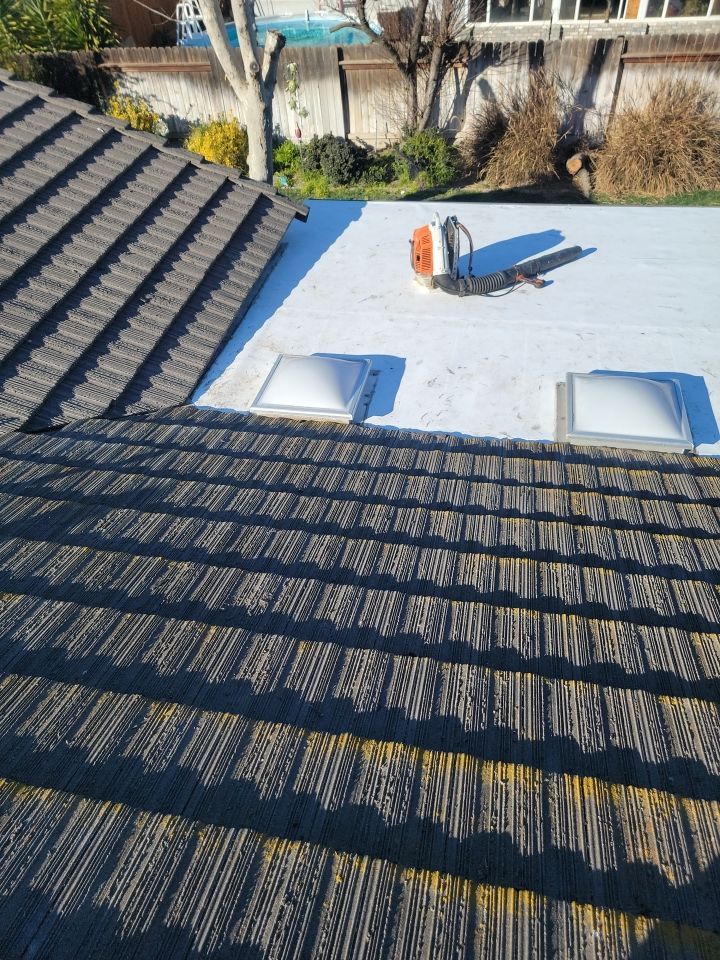 Single-ply roofing system on porch using TPO 60 mil by Straight Edge Roofing Inc