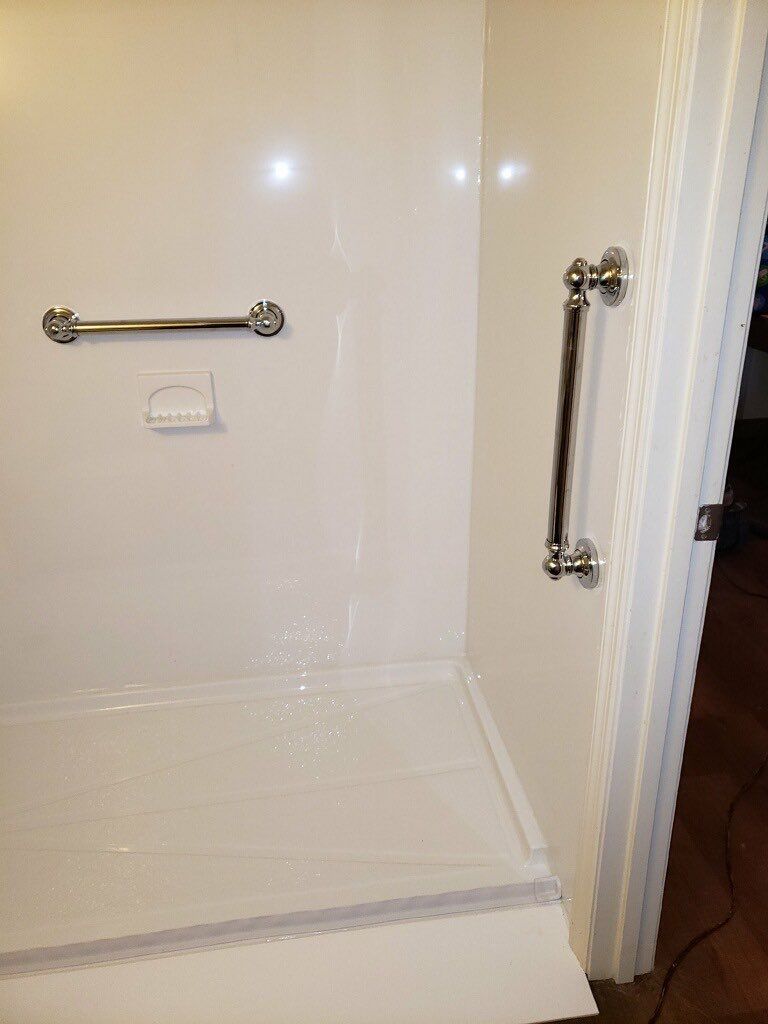 Tub to Shower Conversion using BCI Acrylic Shower System by Secure Construction Company Inc