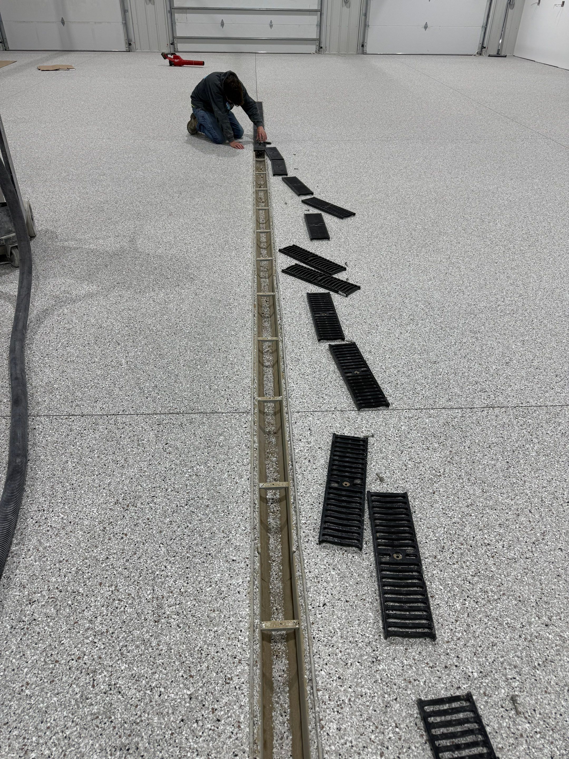Custom Speckled Floor Coating for Large Montrose Shop by Select Painting, Coatings & Garage Cabinets