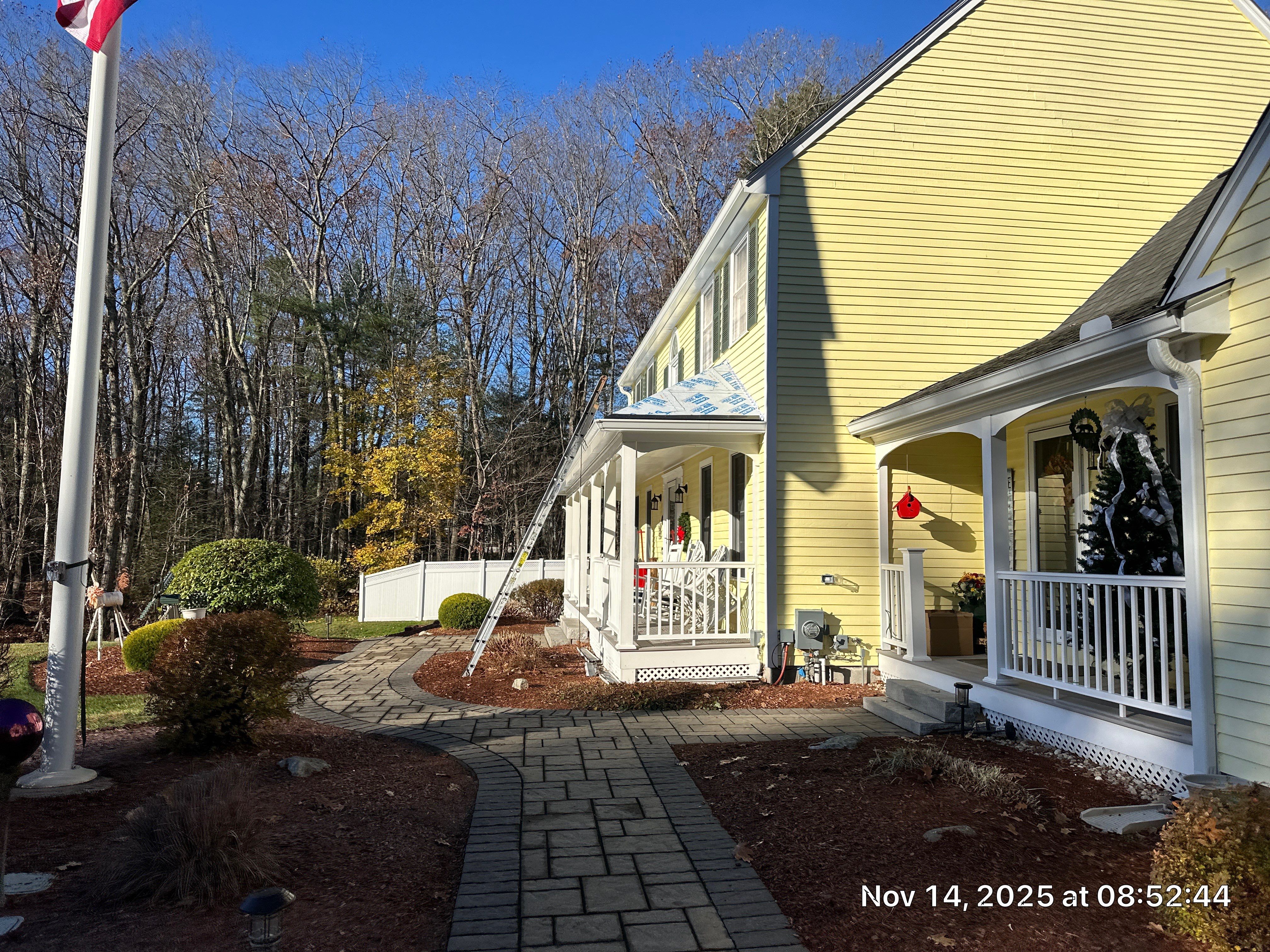 Chelmsford Premium Roof: Onyx Black Shingles with Standing Seam Metal Porch by Mighty Dog Roofing of Greater Middlesex County
