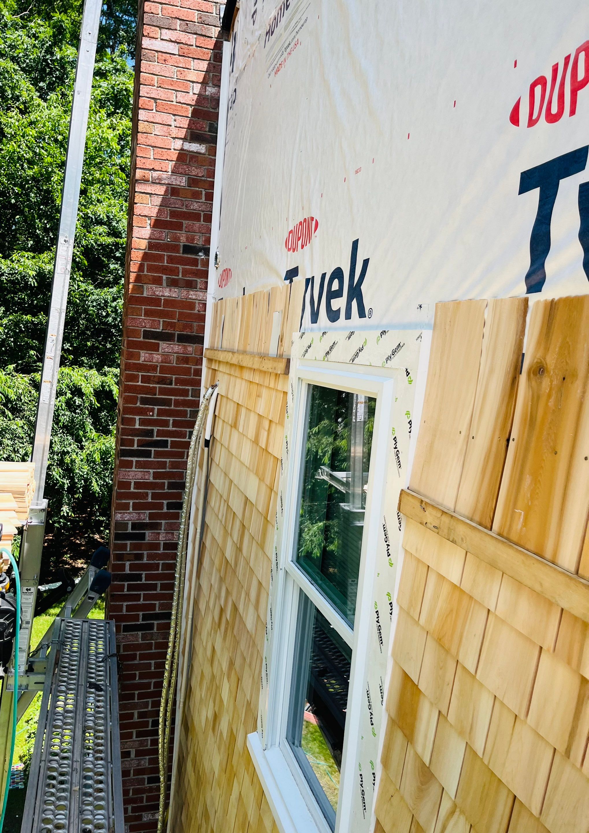 Partial residing project with Red Cedar shingles in Duxbury, MA by UBrothers Construction