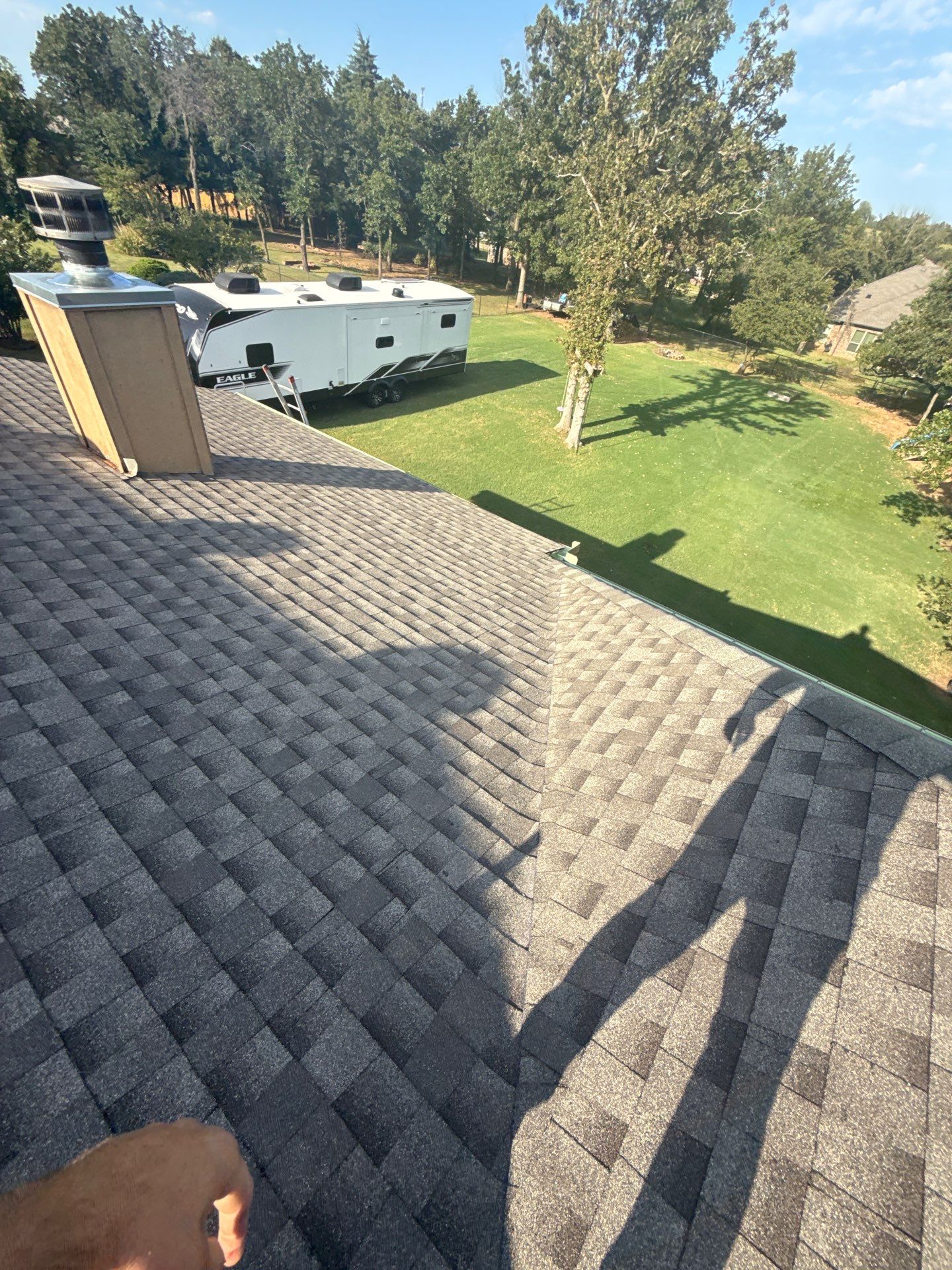 roof replacement in Guthrie by McCann's Roofing and Construction