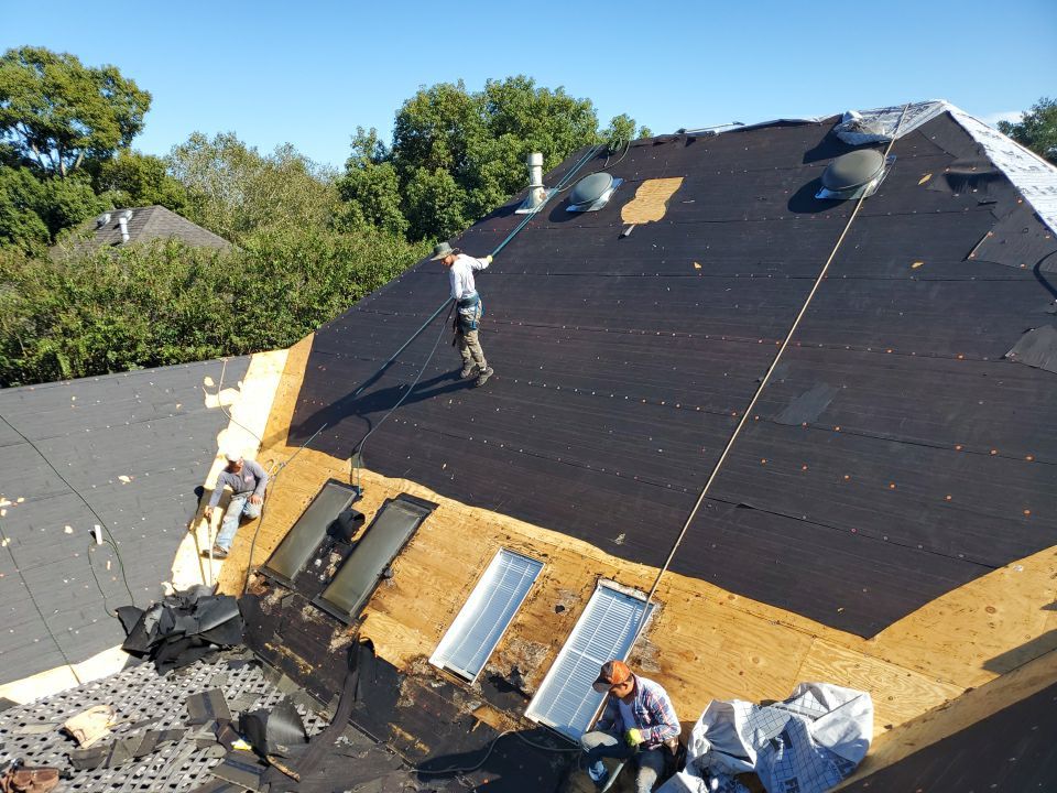 Residential Roofing Installation using Roof Replacement by American Roofing & Construction LLC