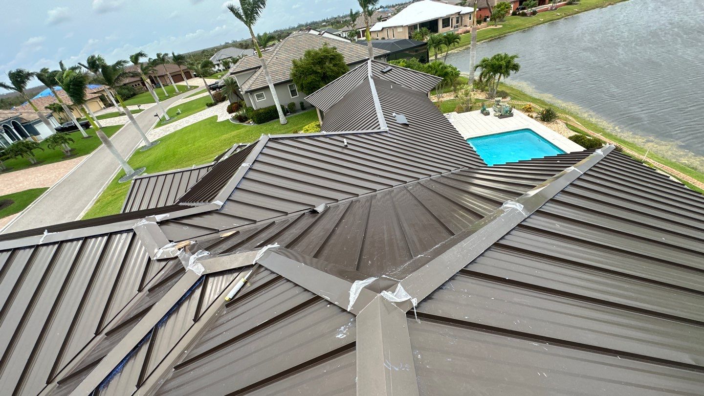 Residential Roofing Installation using Standing Seam Metal Roof in Cape Coral, FL by International Roofing