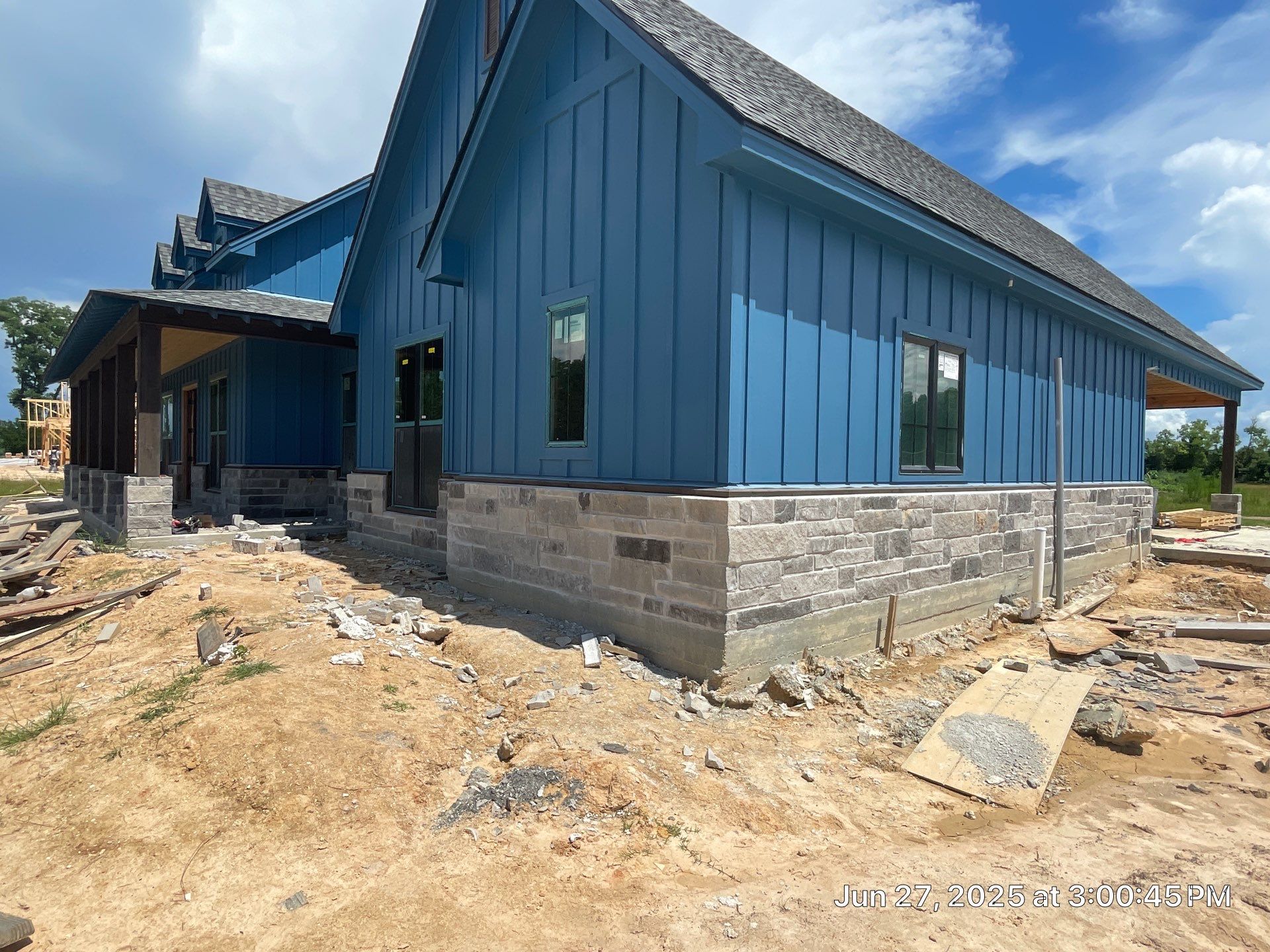 Natural Stone Elegance: Apex Installation Accented by Blue Siding by Apex Conventional Stucco Llc