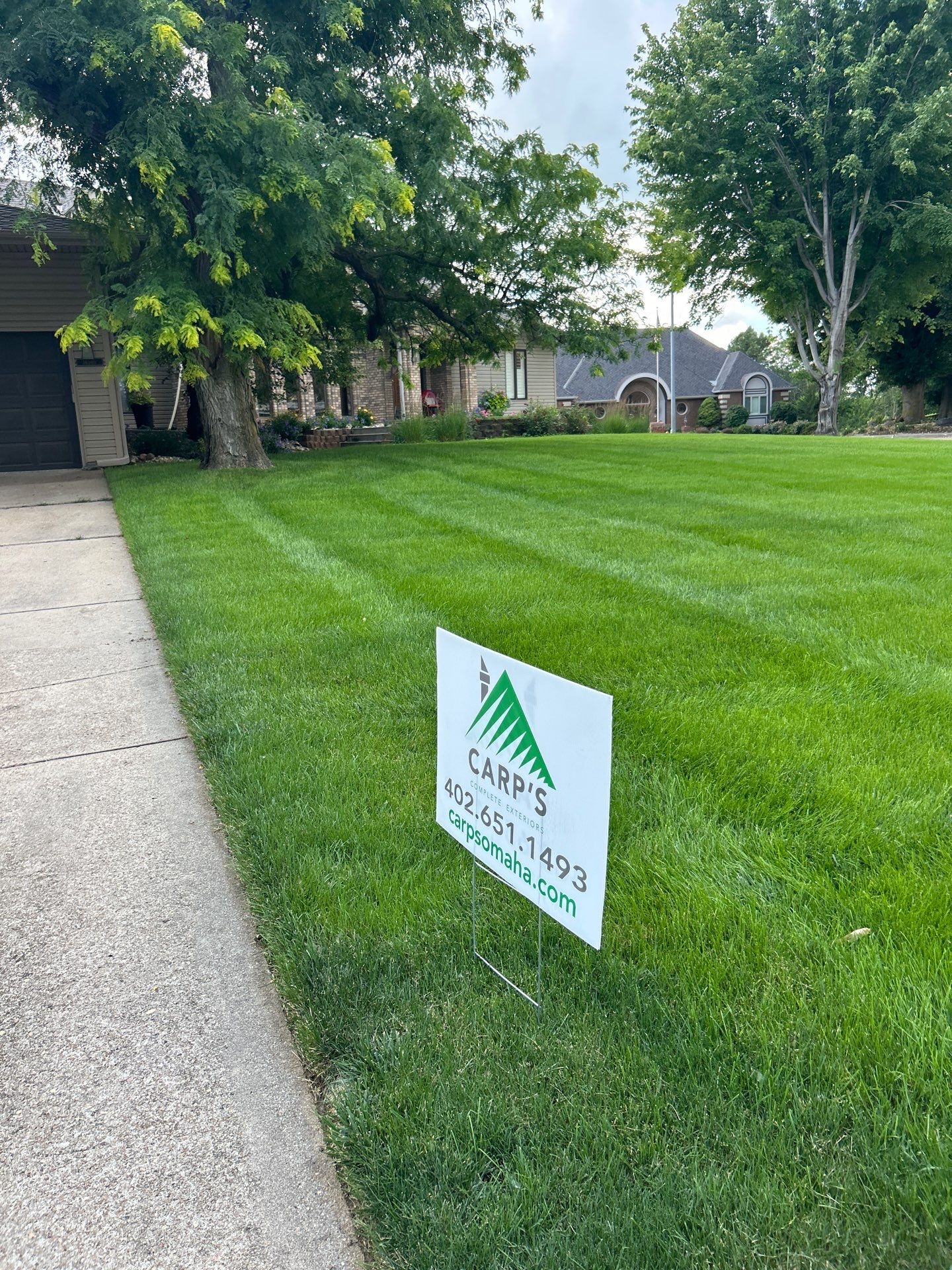 Siding and Composite Deck Renovation in Omaha, Nebraska by Carps Complete Exteriors