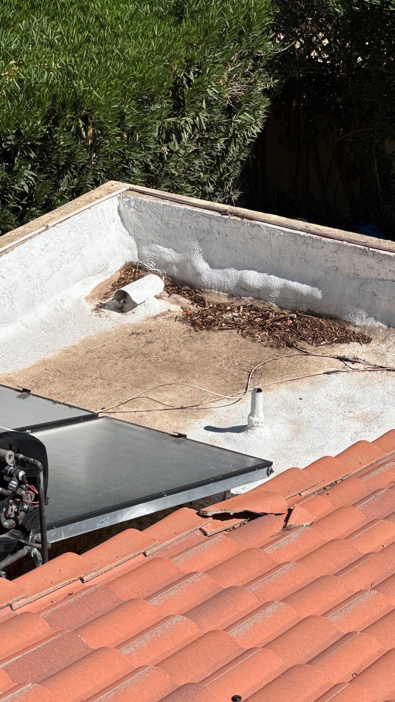 Re-coat & Tile Job by All Storm Roofing & Construction