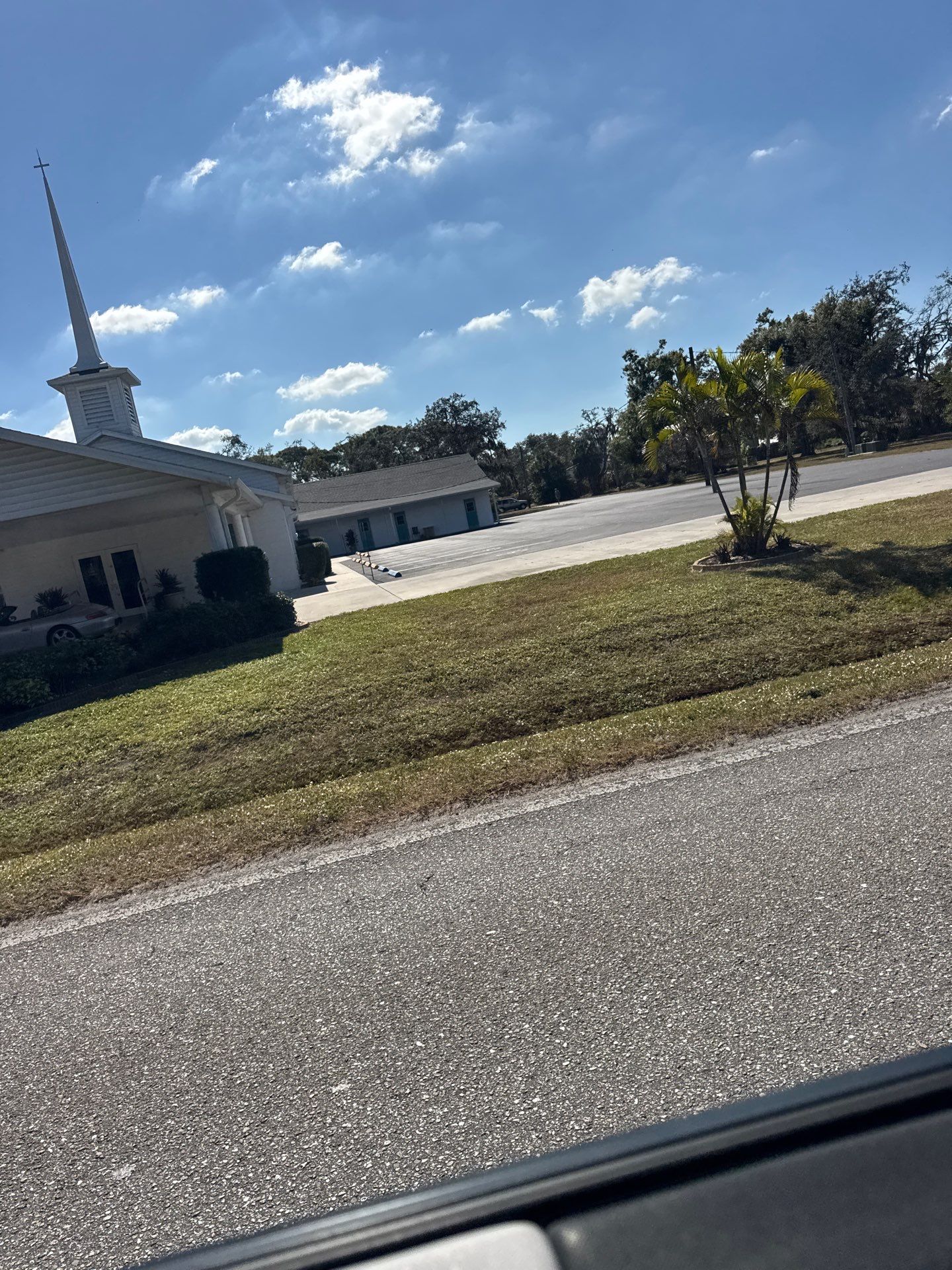 Downspout Installation using White Down Spouts in Sarasota FL by Gutter Professors