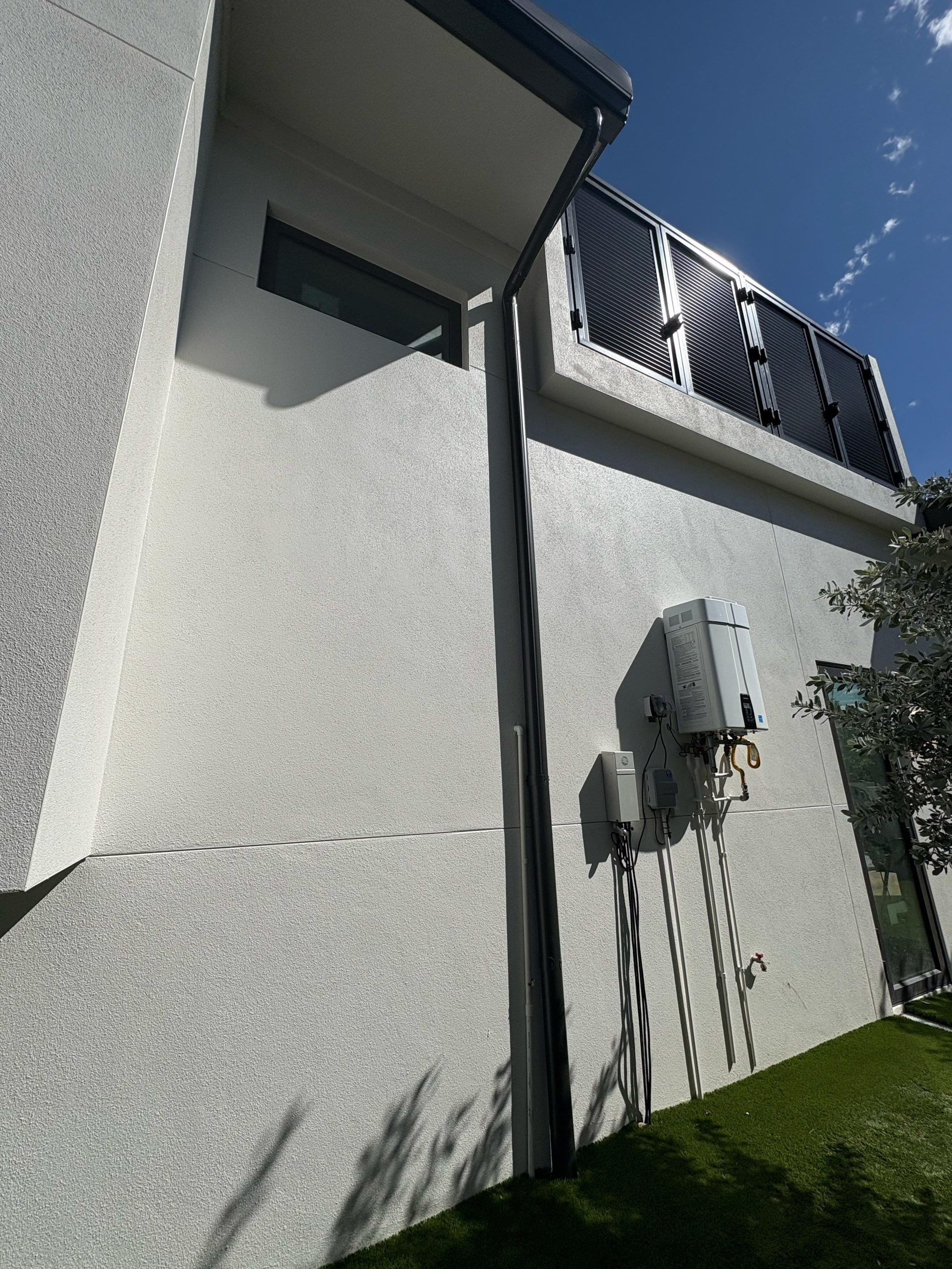 Seamless Aluminum Gutter Installation using black seamless gutters in Sarasota FL by Gutter Professors