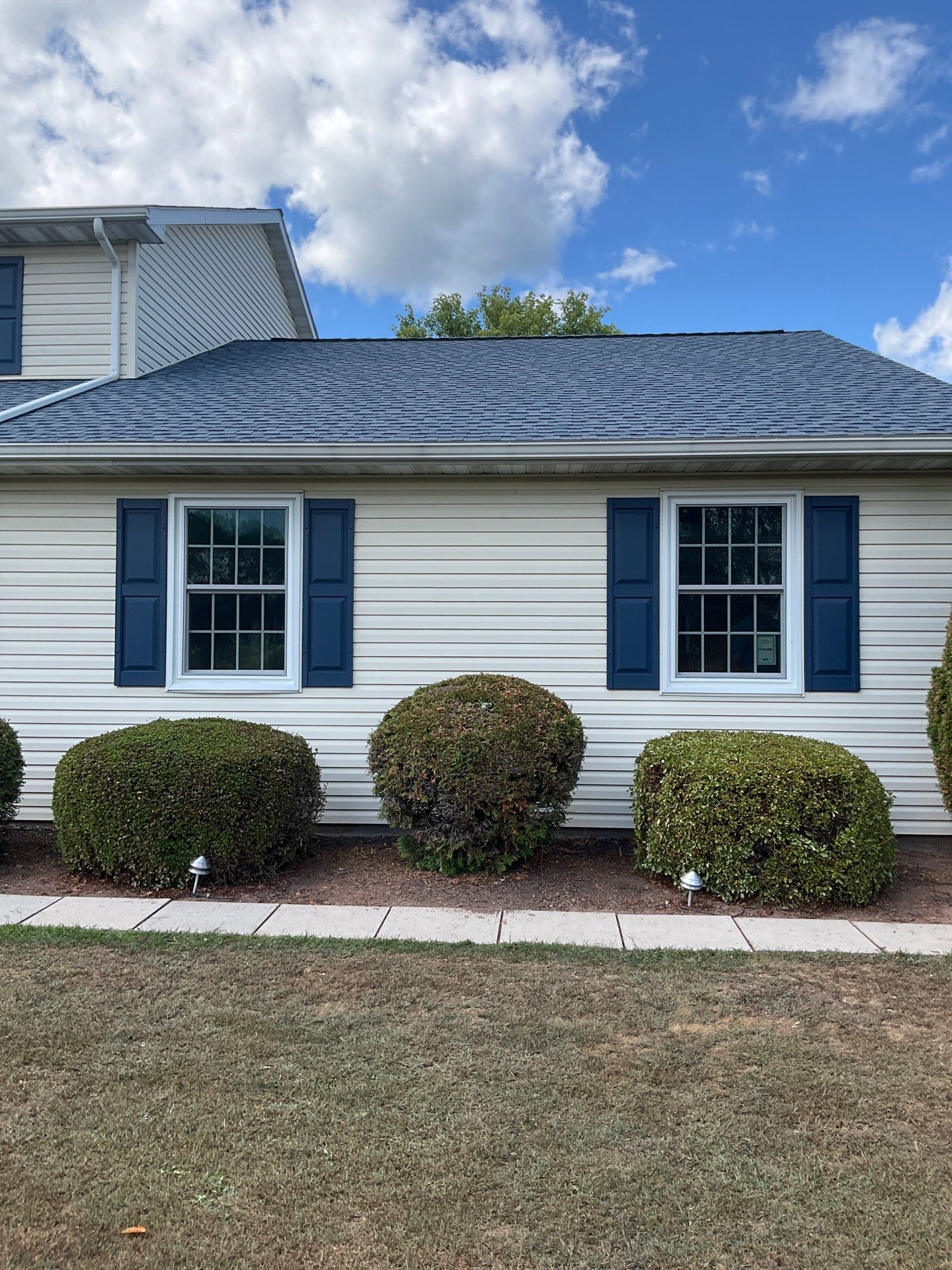 Shingle Roof-Biscayne Blue- and windows by Esh Builders
