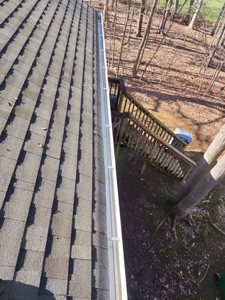 Gutter Cleaning using water by Power Wash Masters LLC