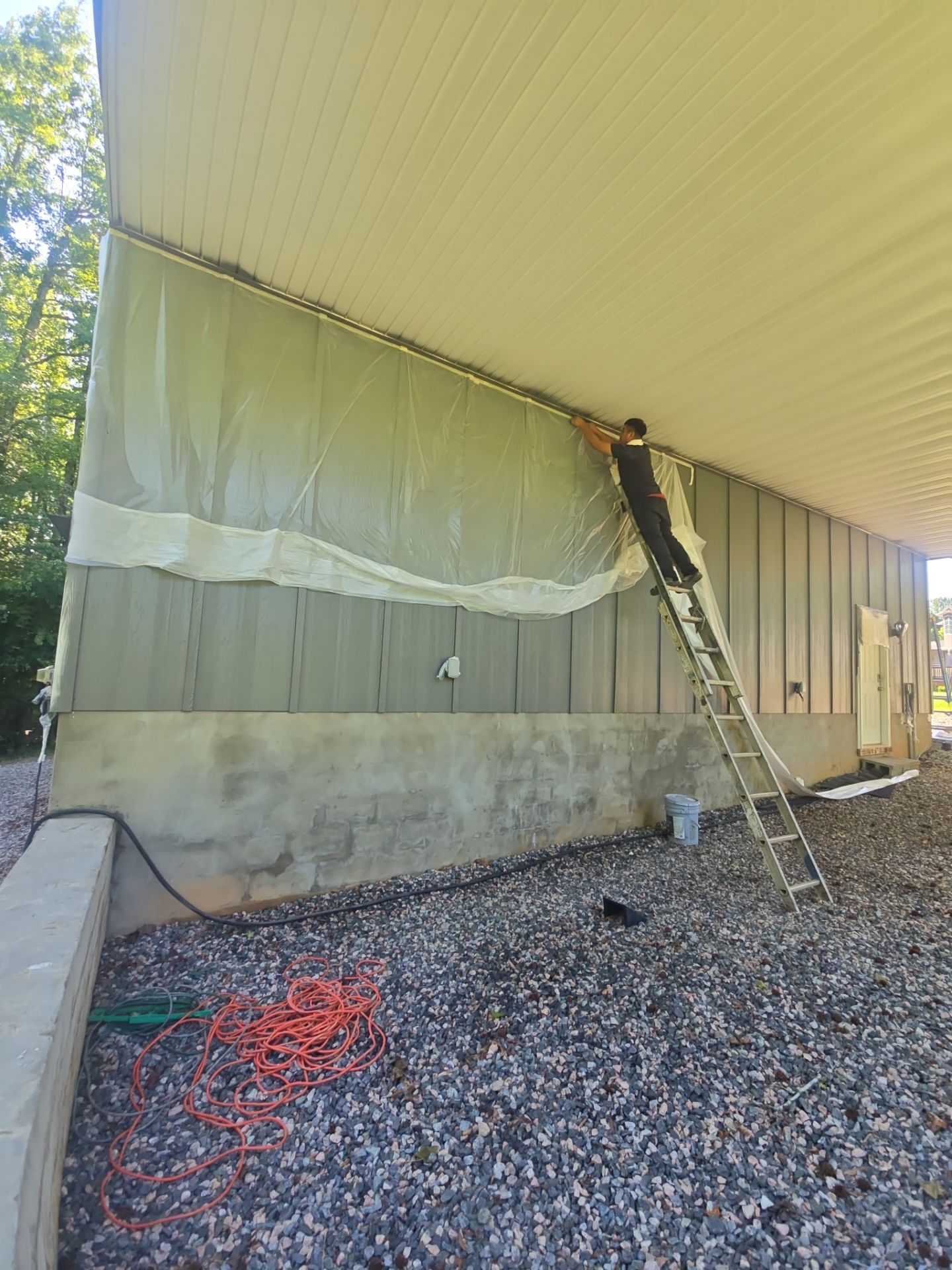 Siding replacement, exterior painting, and front door staining. by GonzalezPainters & Contractors Inc
