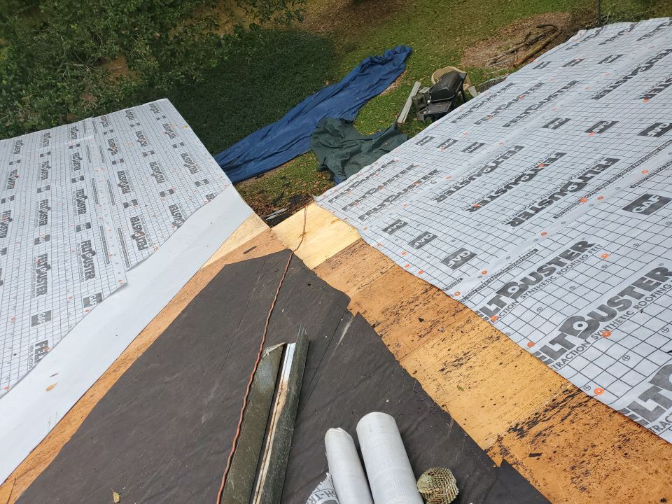 Residential Roofing Installation using Roof Replacement by American Roofing & Construction LLC