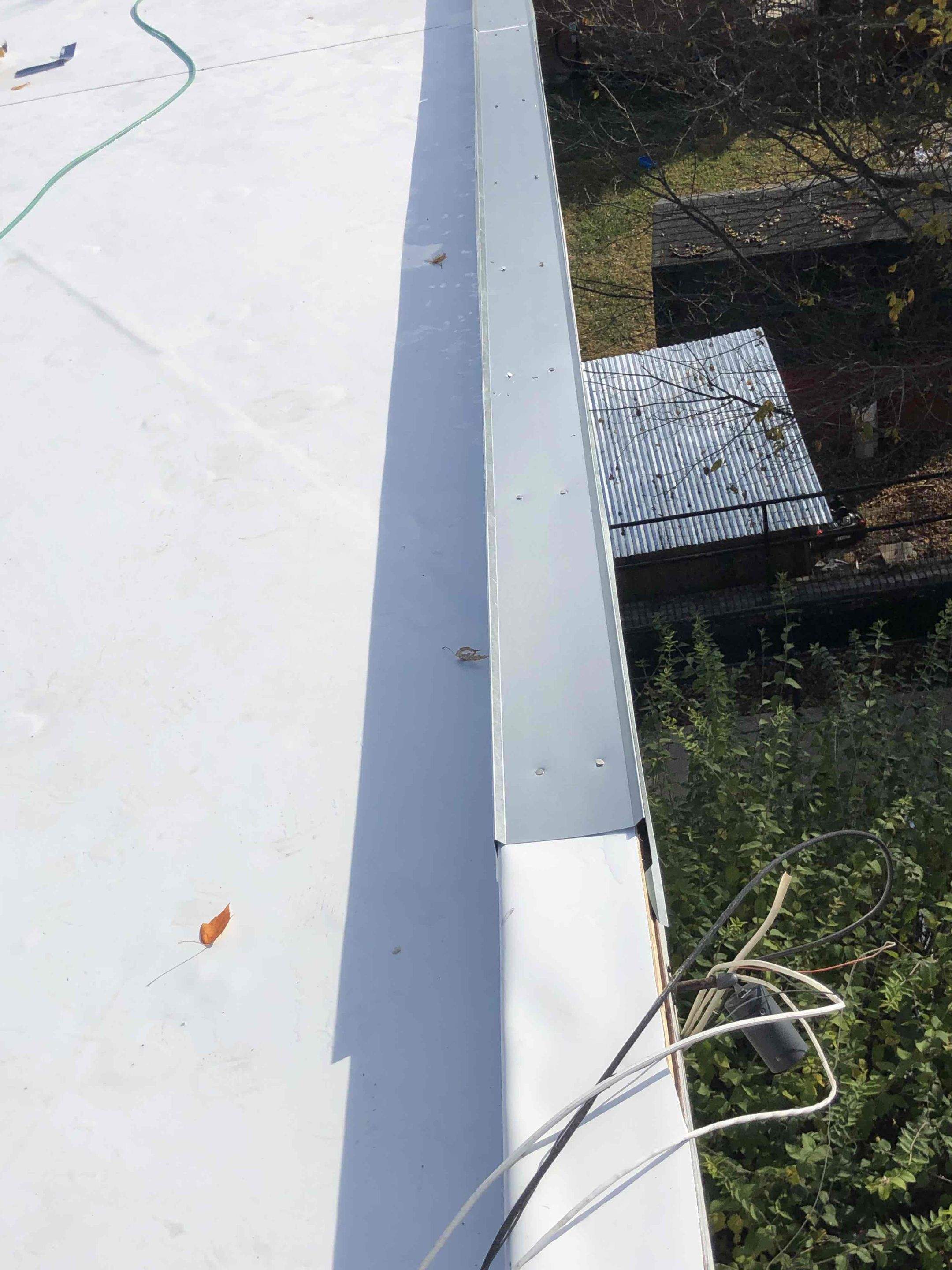 Roof Installation using Silicone TPO by ExteriorPros
