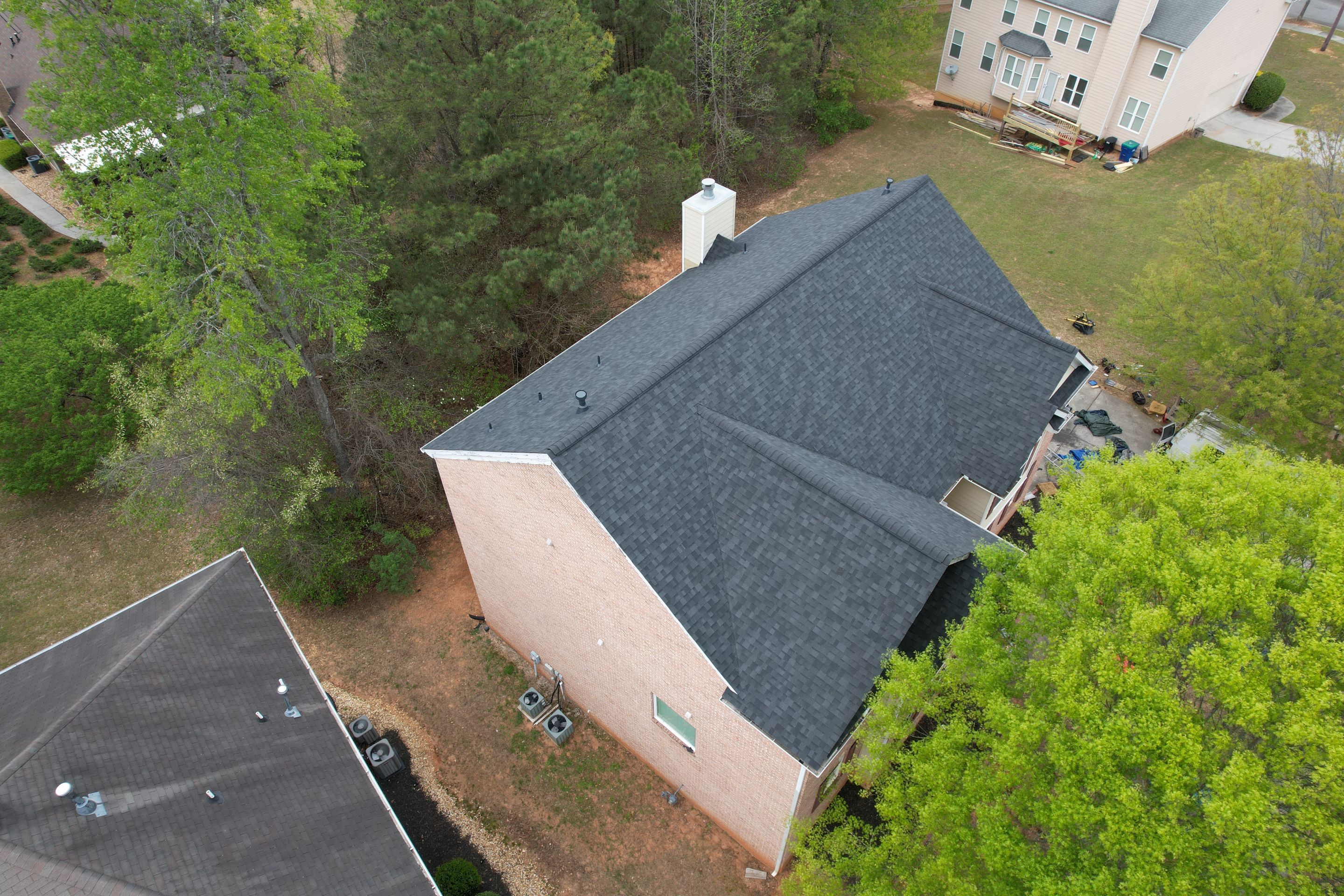 Residential Roofing Installation using Owens Corning Onyx Black by Inspector Roofing and Restoration