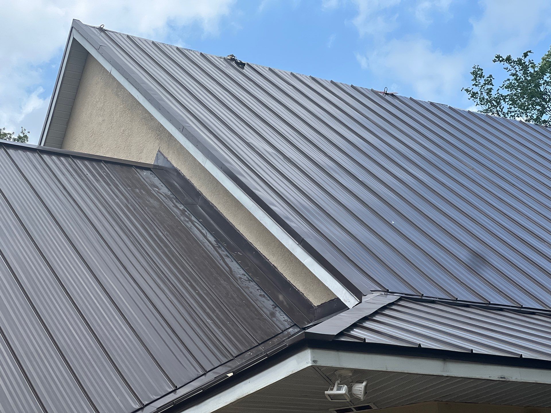 Charcoal Brown Standing Seam by Reimagine Roofing