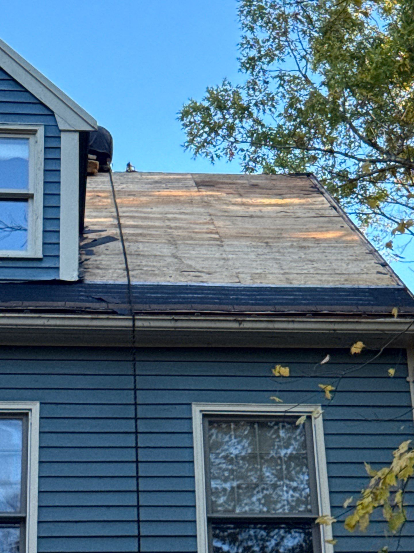 Milford Complete Roof Replacement with Velux Skylight Upgrade by Mighty Dog Roofing of Greater Middlesex County