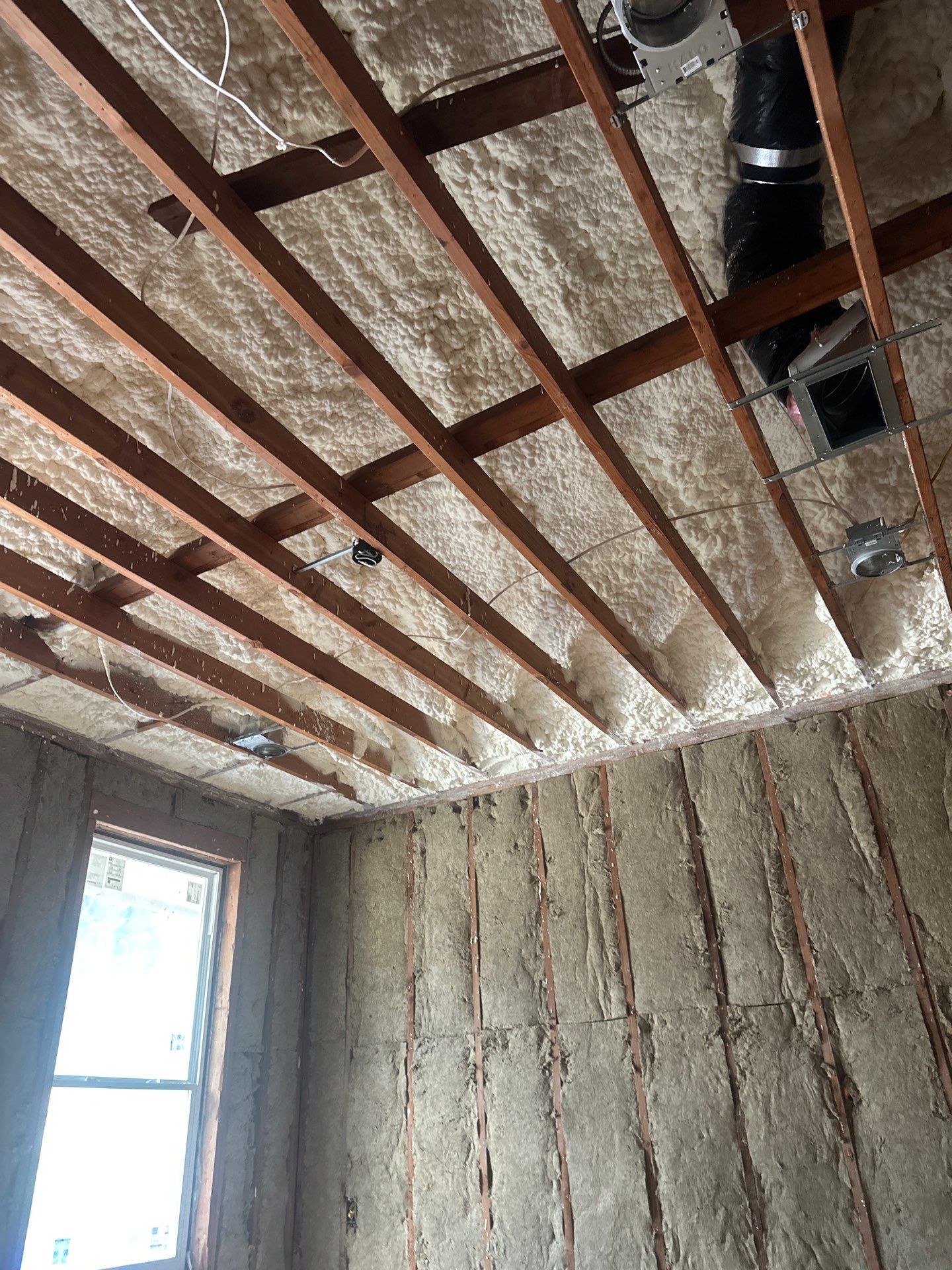 Open cell spray foam & rockwool job completed in Dallas TX by Apex Insulation Solutions