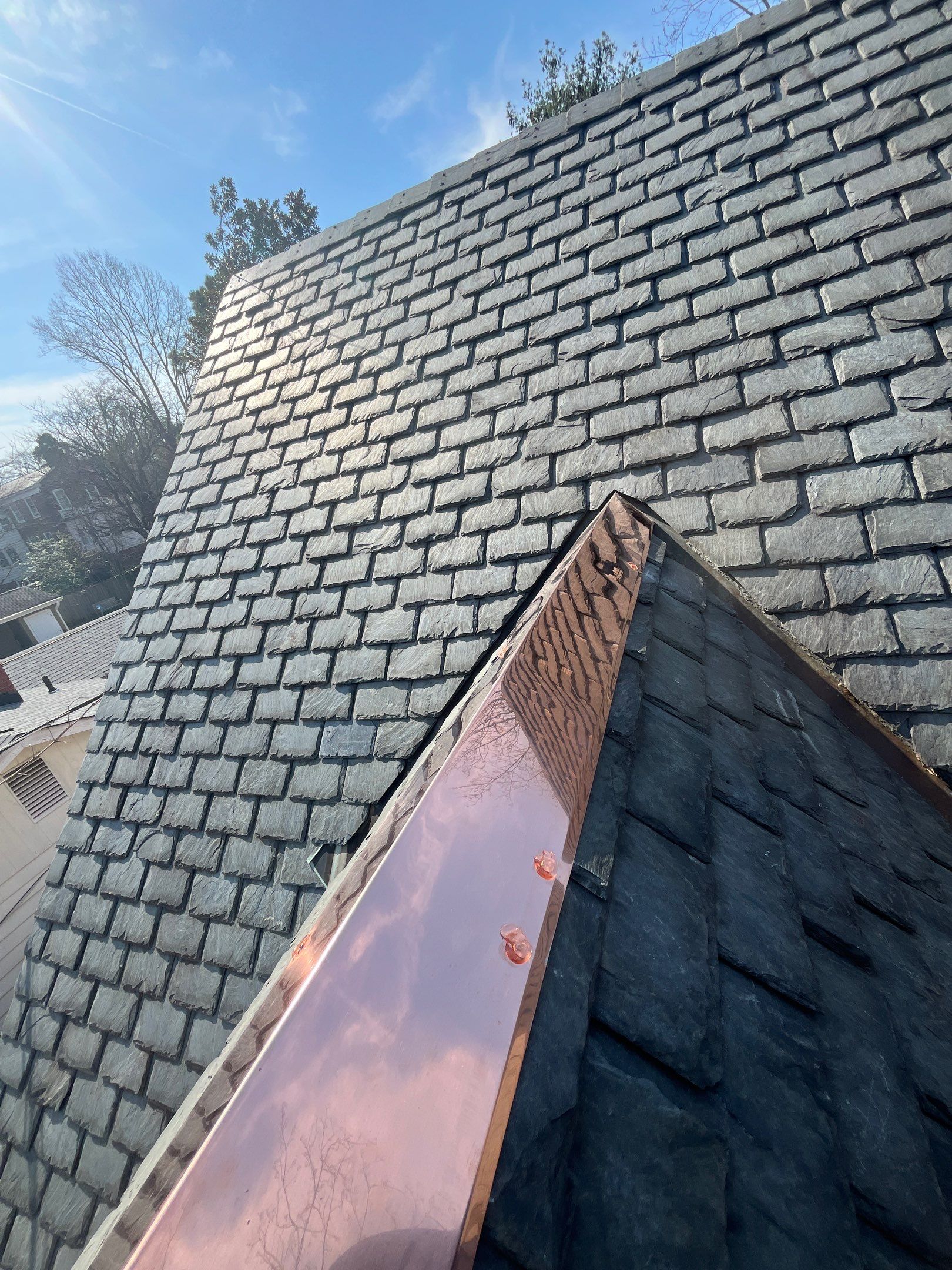 Slate Roof Restoration and Copper Ridge Cap Install in Richmond by Cade Construction