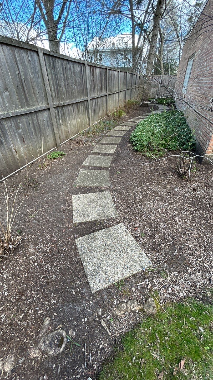 Flagstone stepper cleaning by Northern Power Washing LLC.