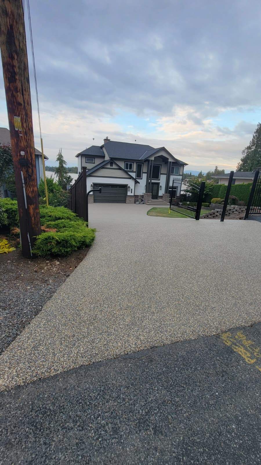 Big Sur Vuba Driveway by Concrete Coating Experts Inc.