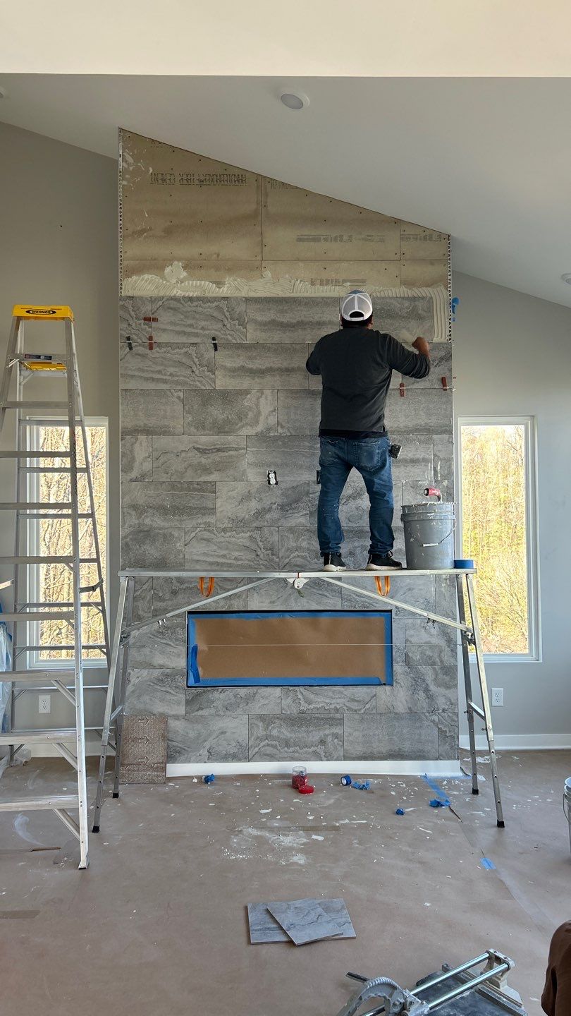 Floor to Ceiling Fireplace Surround by Footprints Floors of Nashville