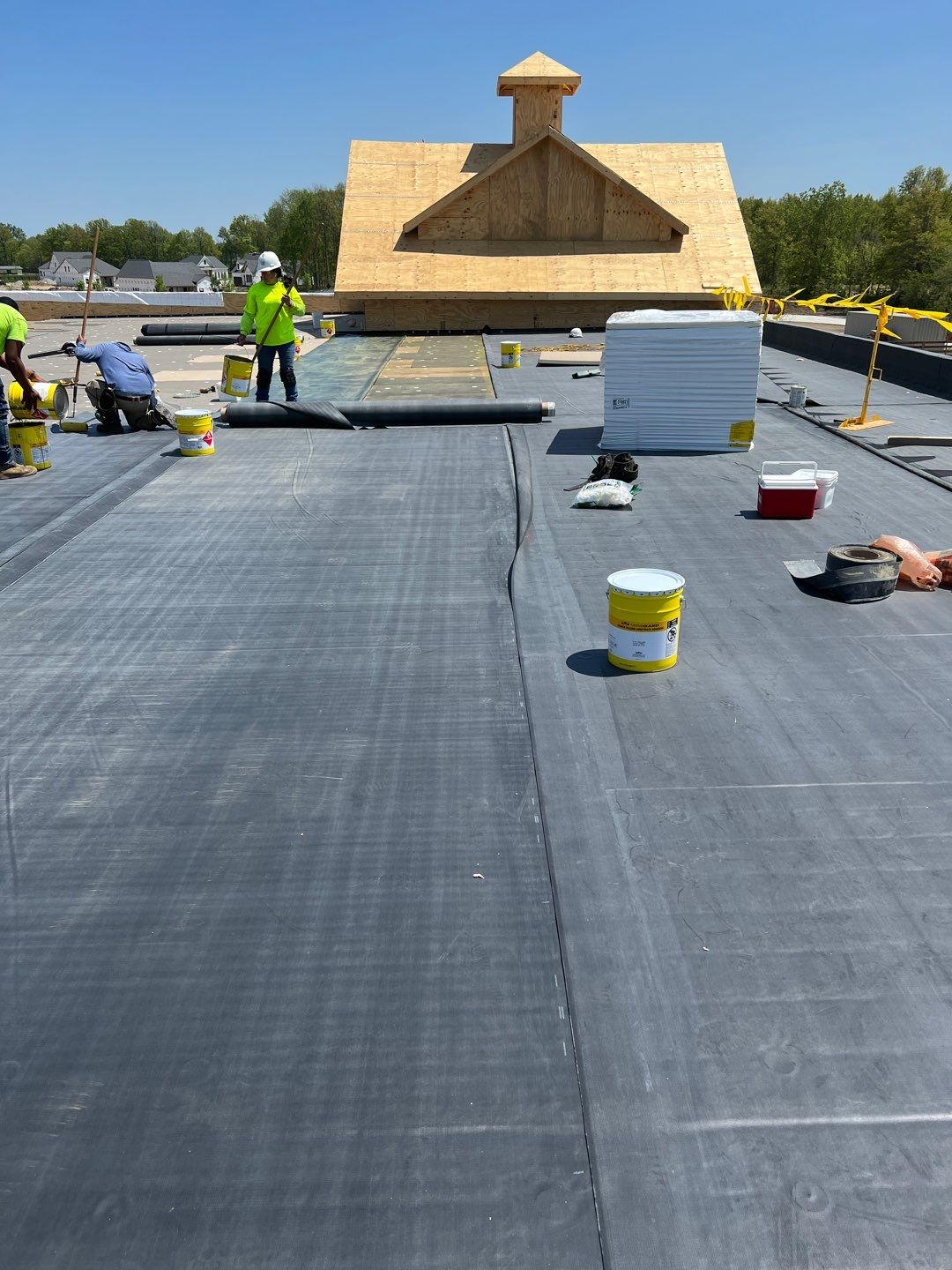 Commercial Roofing Installation using 60 mil rubber roof  by Nitro Roofing and Construction