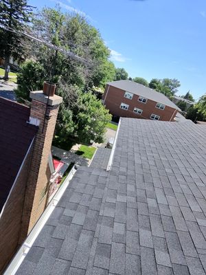 Turtle Shell gutter protection installation in Chicago, IL 60634, photograph 20