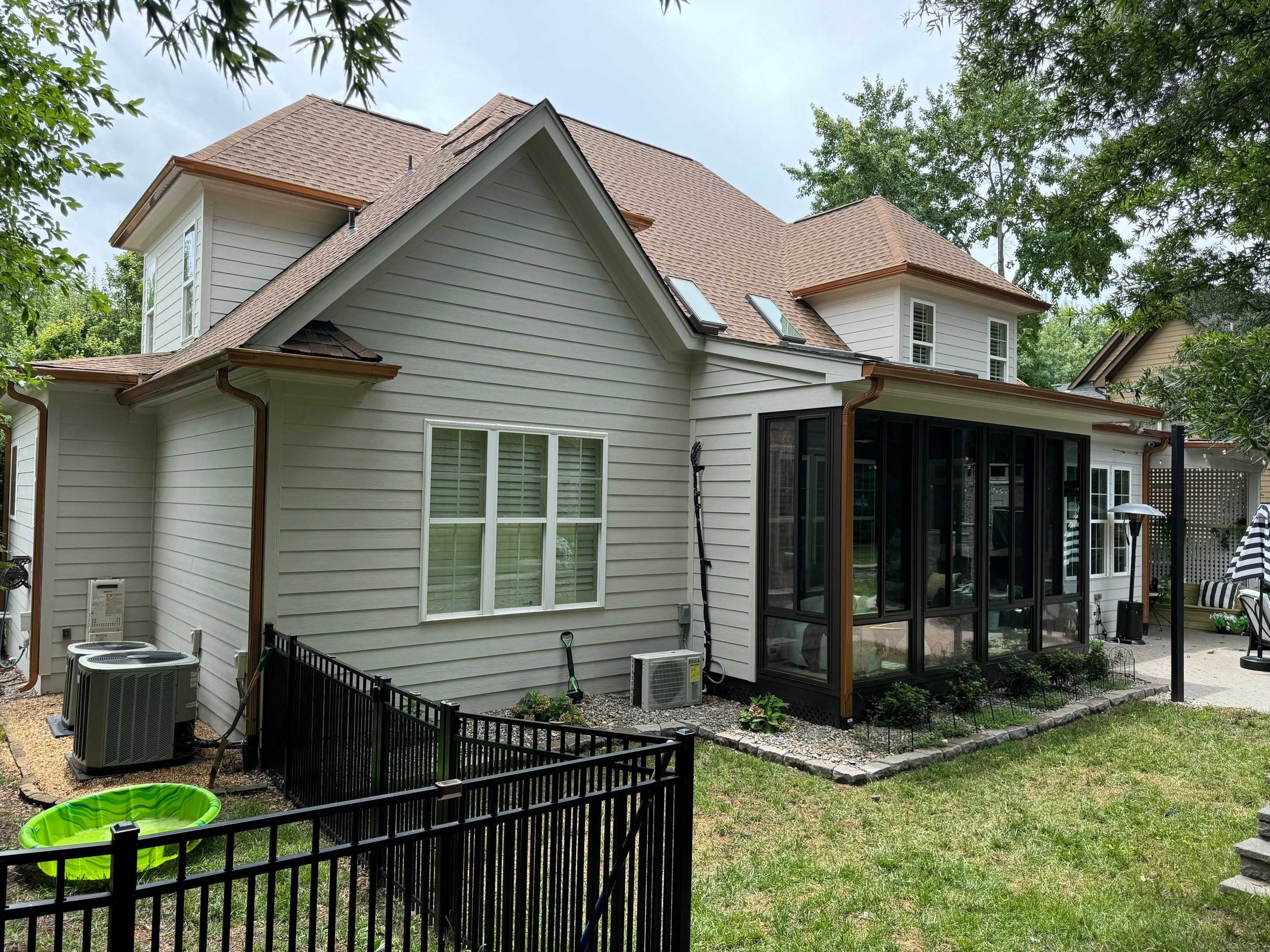 Roof Replacement - GAF Timberline HDZ Shakewood - 6” coppertone seamless gutters by Pro Performance Roofing