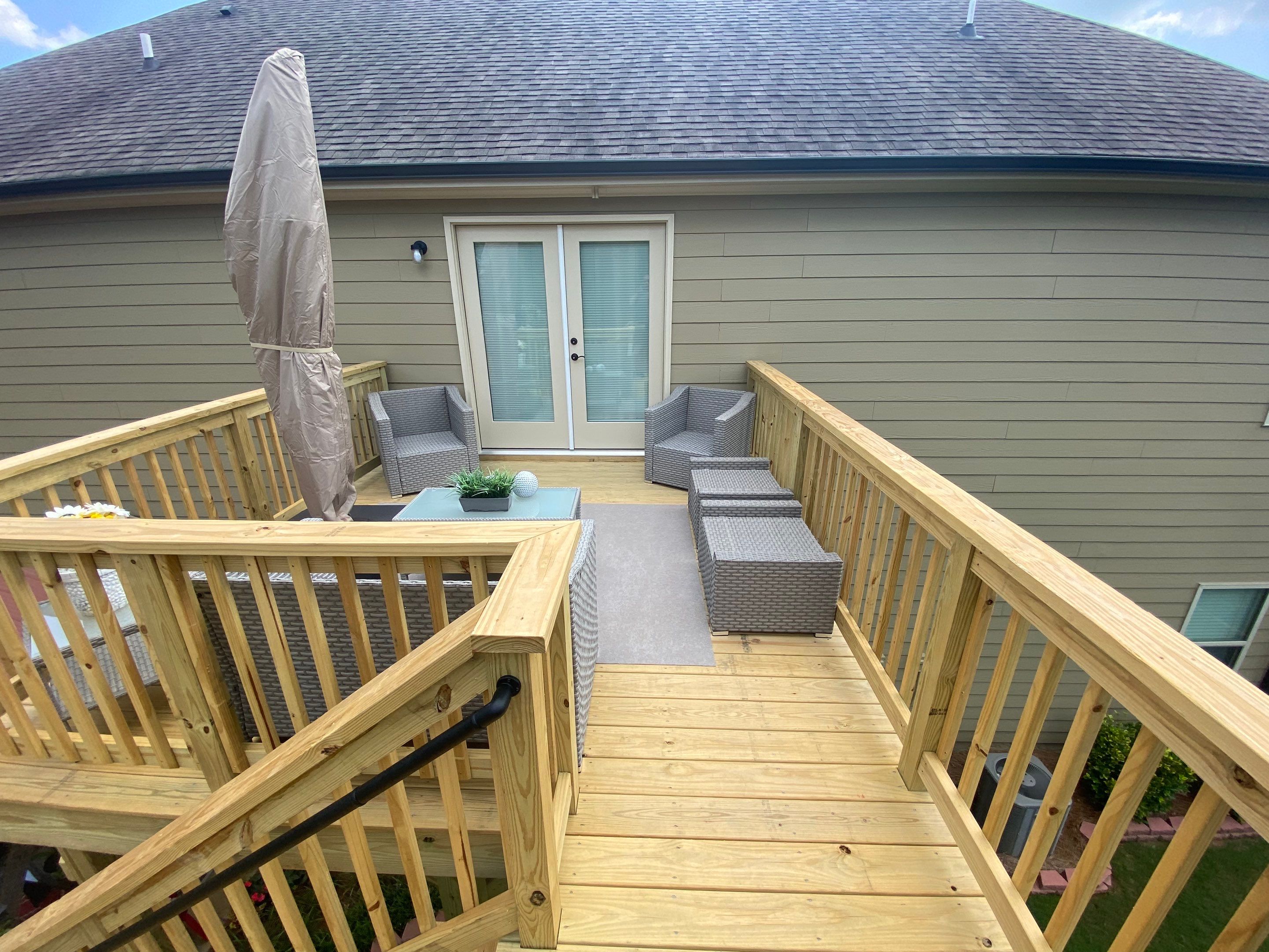 Pressure-Treated Wood Deck and Staircase Construction in Cumming, Georgia by Swift Home Renovations