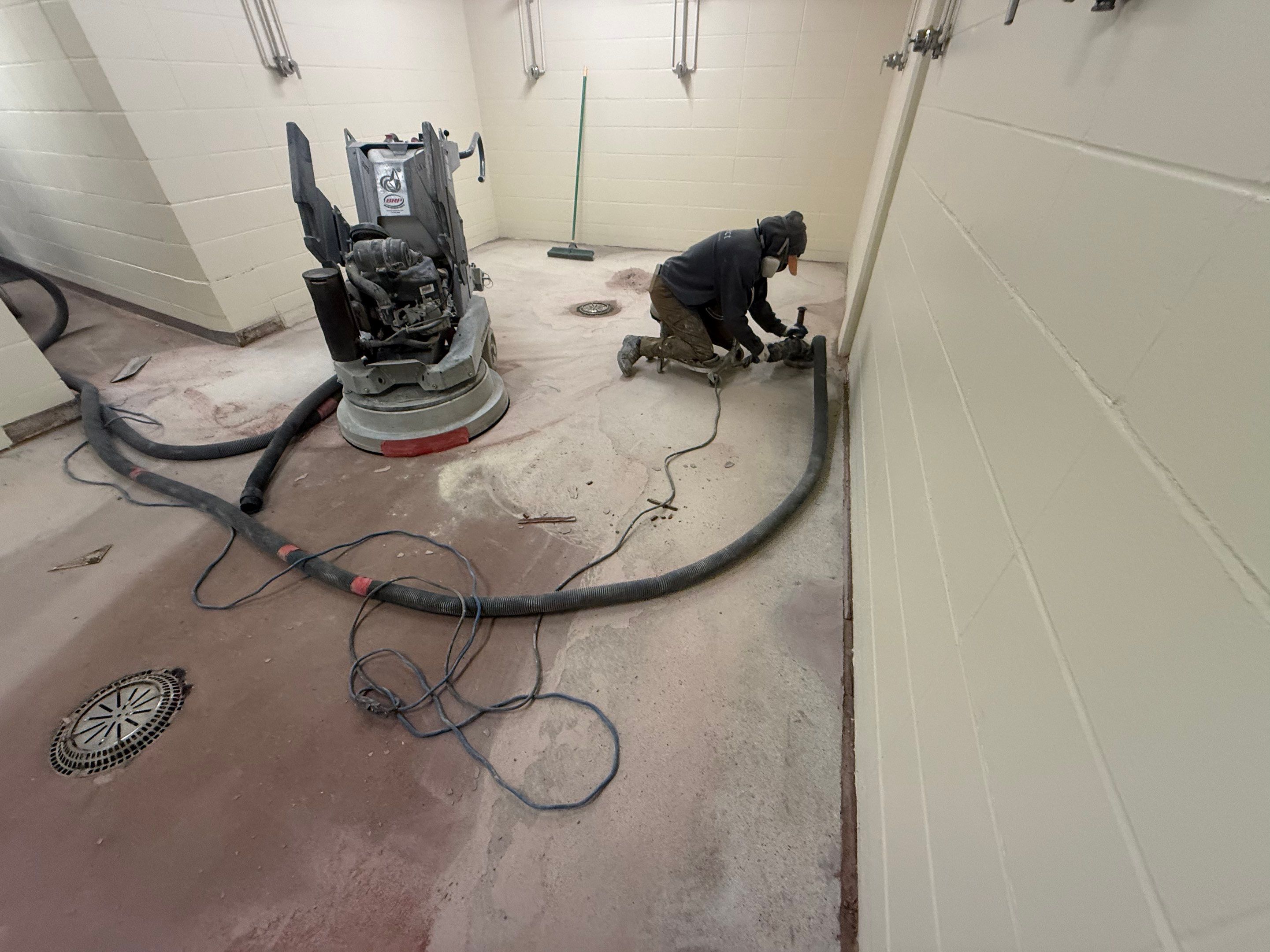 Seamless Epoxy Floor Coating at the Sioux Falls Canaries Facility by Select Painting, Coatings & Garage Cabinets