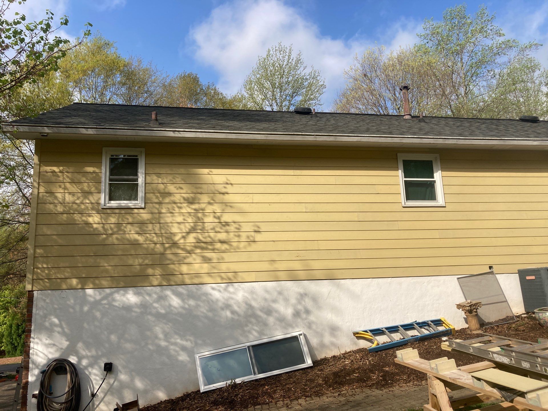 Window, Siding, & Rotten Wood Replacement with Exterior Painting in Woodstock, GA by Nelson Exteriors 