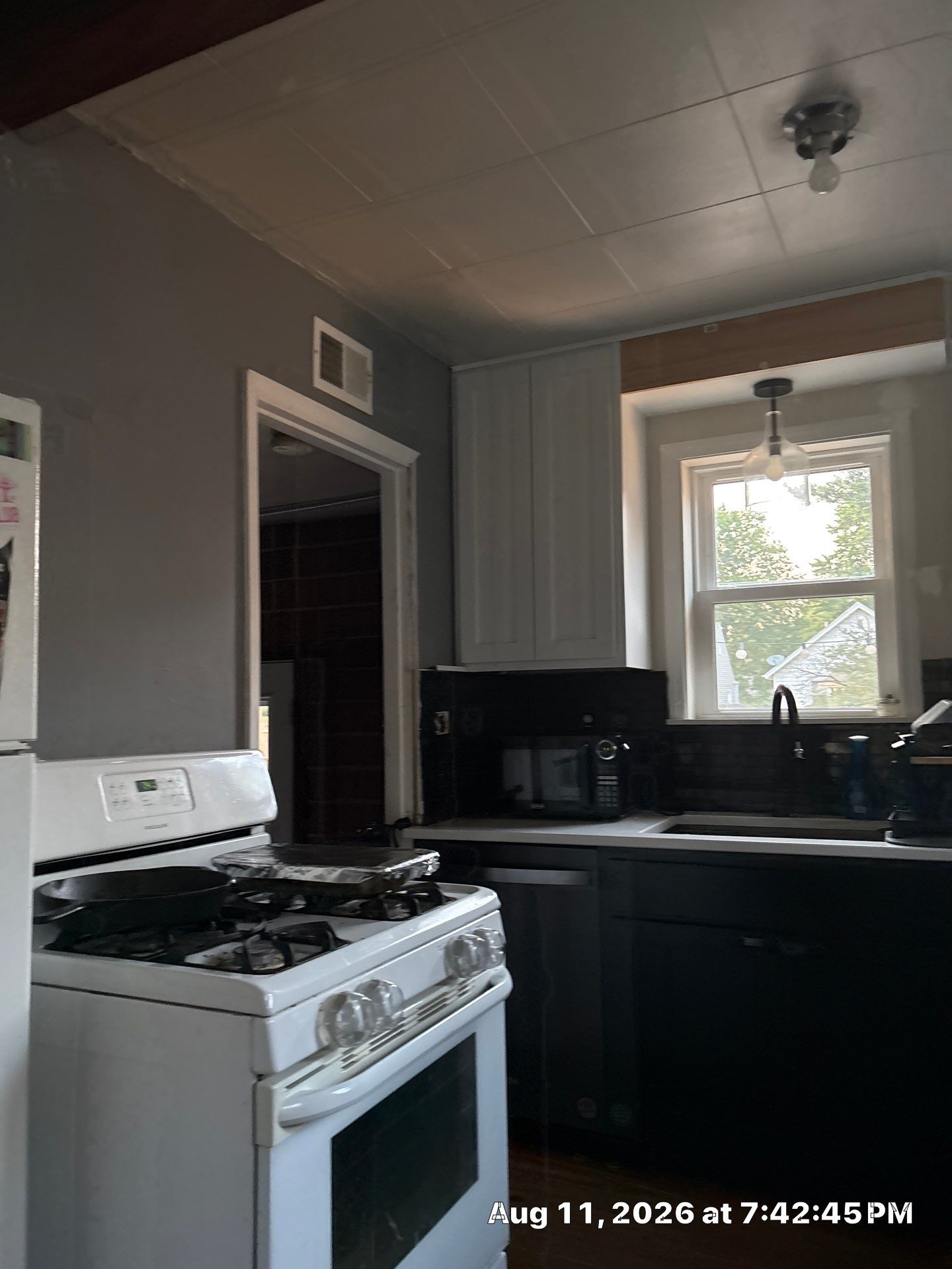 Two-Tone Kitchen Remodel with Black Subway Tile in Lincoln by CompanyCam Sales Demo