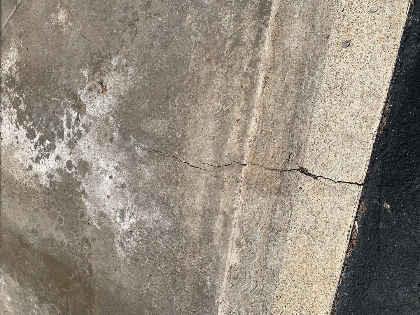 Silverado garage floor and patio coating  by NG Masonry & Construction LLC