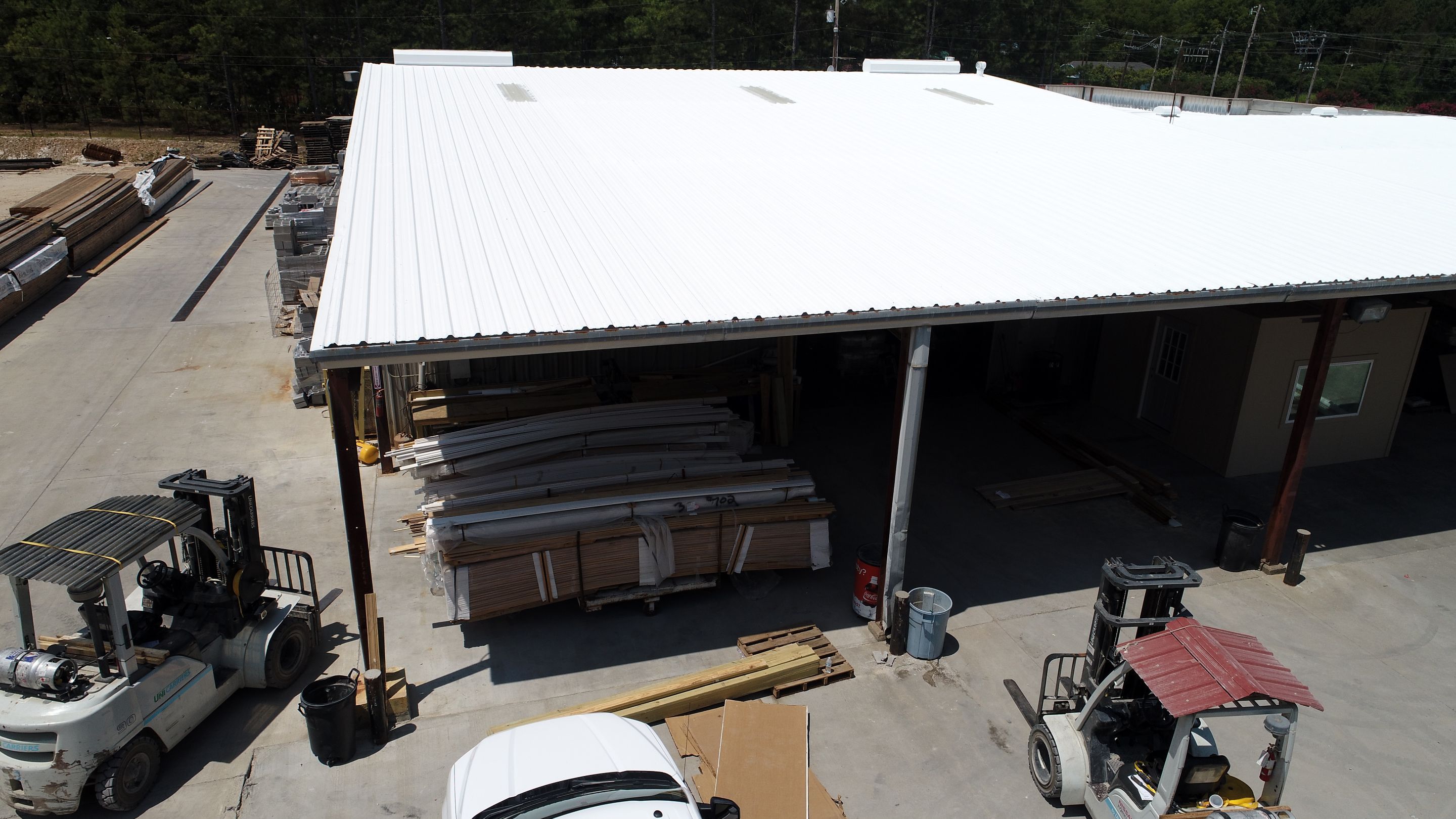 Commercial Roofing Installation using Aldocoat Coatings by Hostetler Roofing
