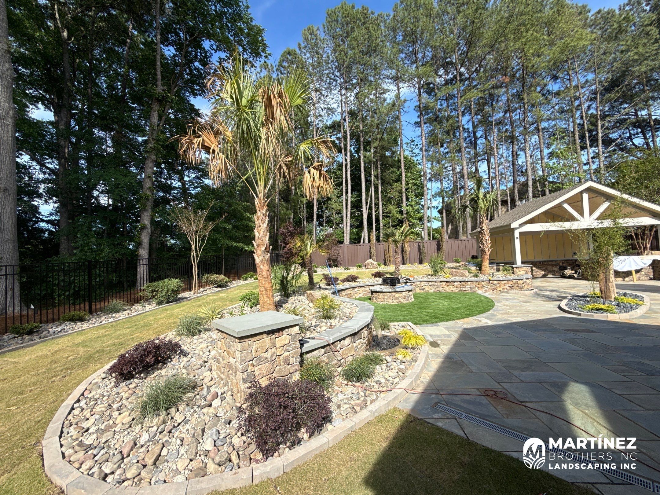 Backyard oasis in Cary by Martinez Brother’s Nc Landscaping Inc