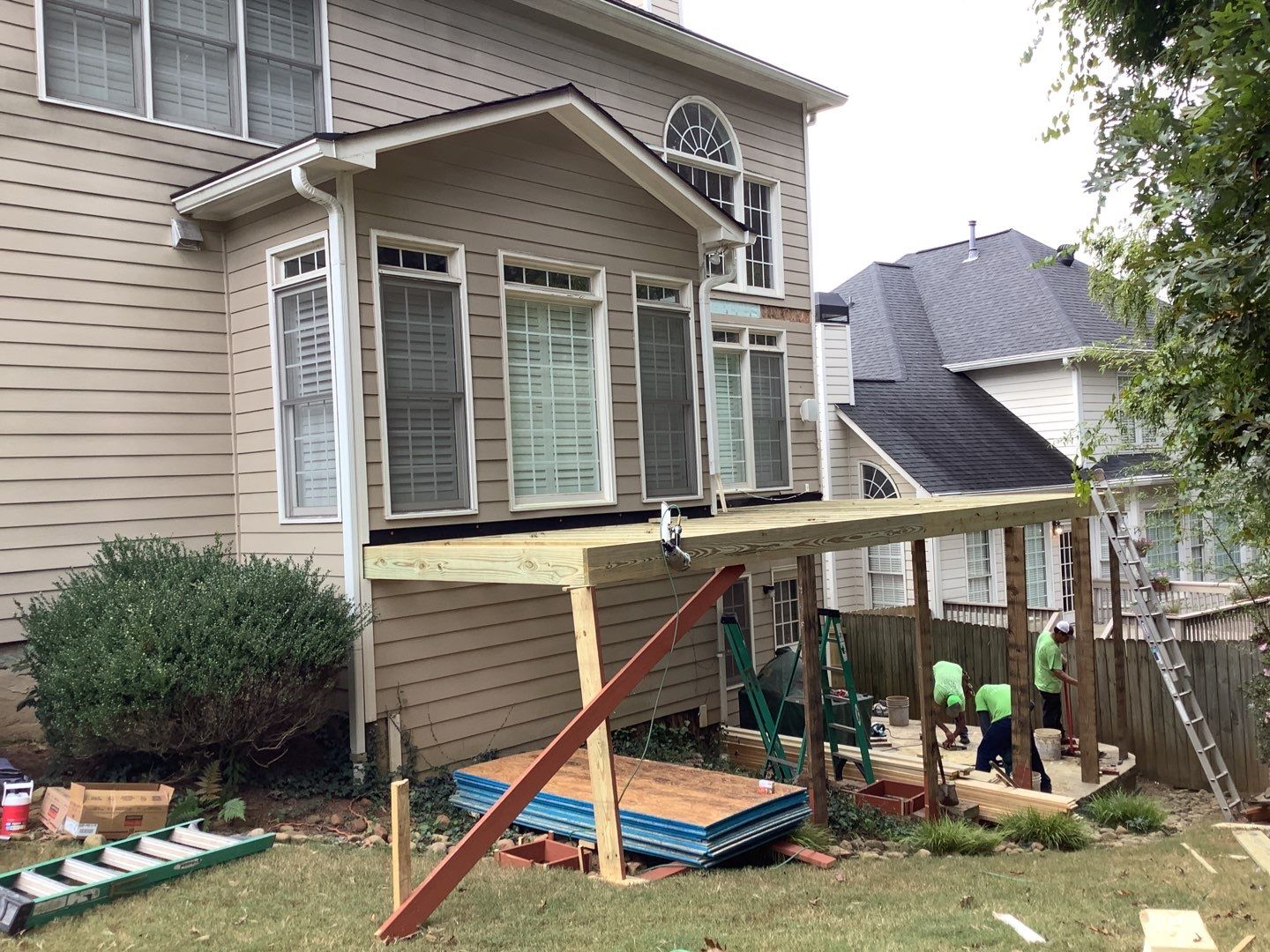 Smyrna Composite Deck and Covered Porch Renovation by Swift Home Renovations