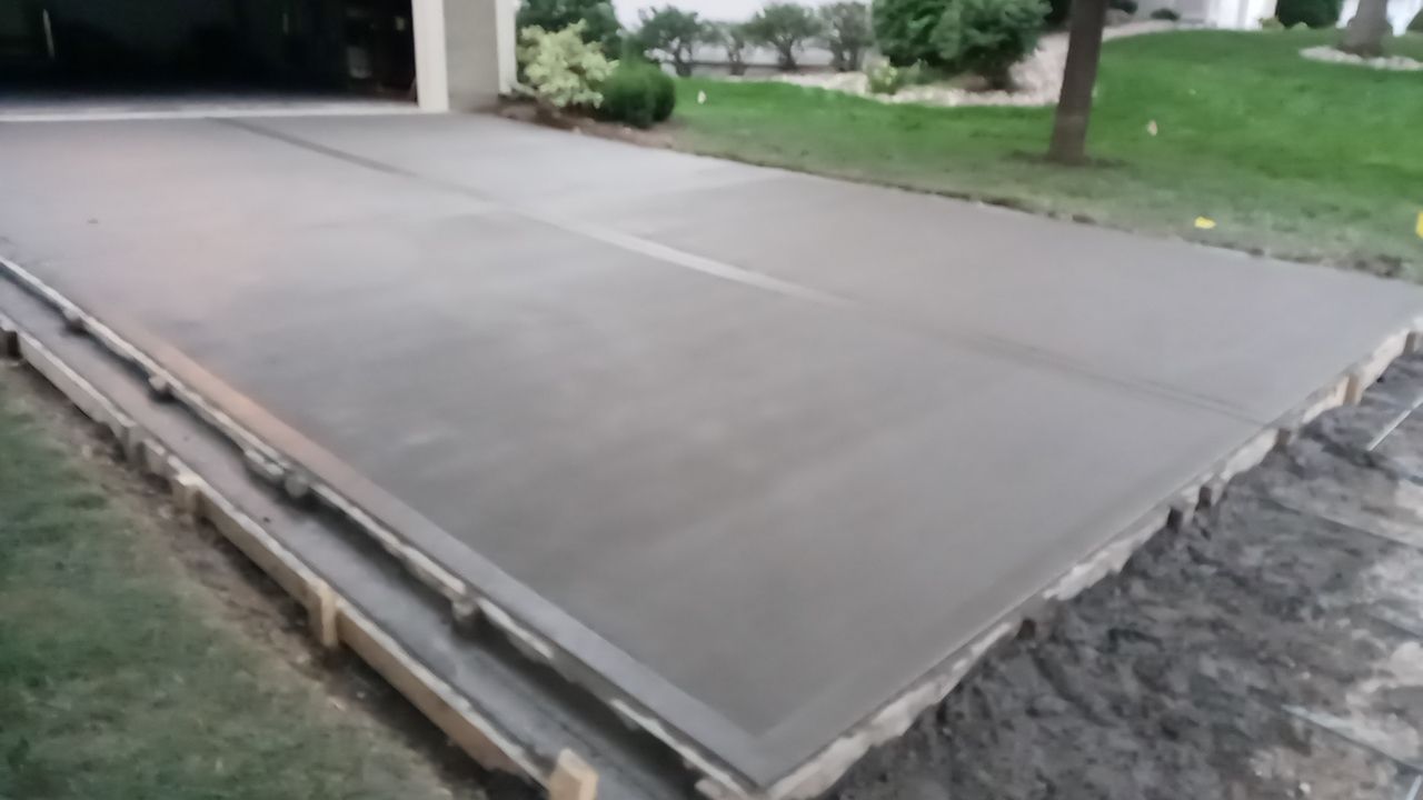 New Driveway and Sidewalk by LAND ESCAPES LLC