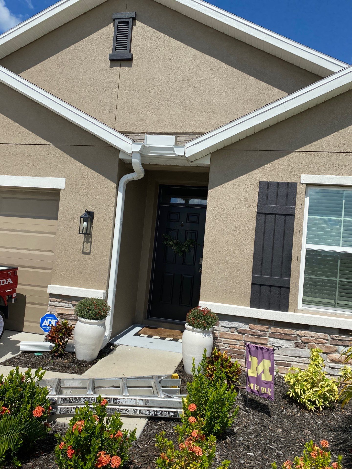 Gutter System with Downspouts in Bradenton FL by Gutter Professors