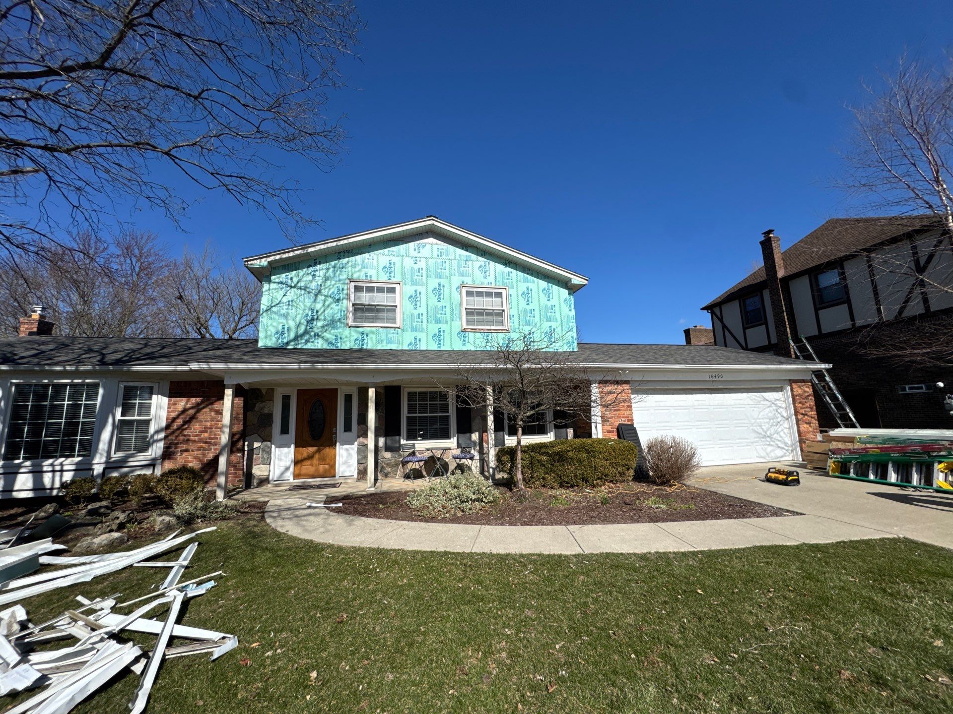 Siding Replacement using Alside Charcoal Smoke and Roof Replacement using Owens Corning Peppercorn by 180 Contractors